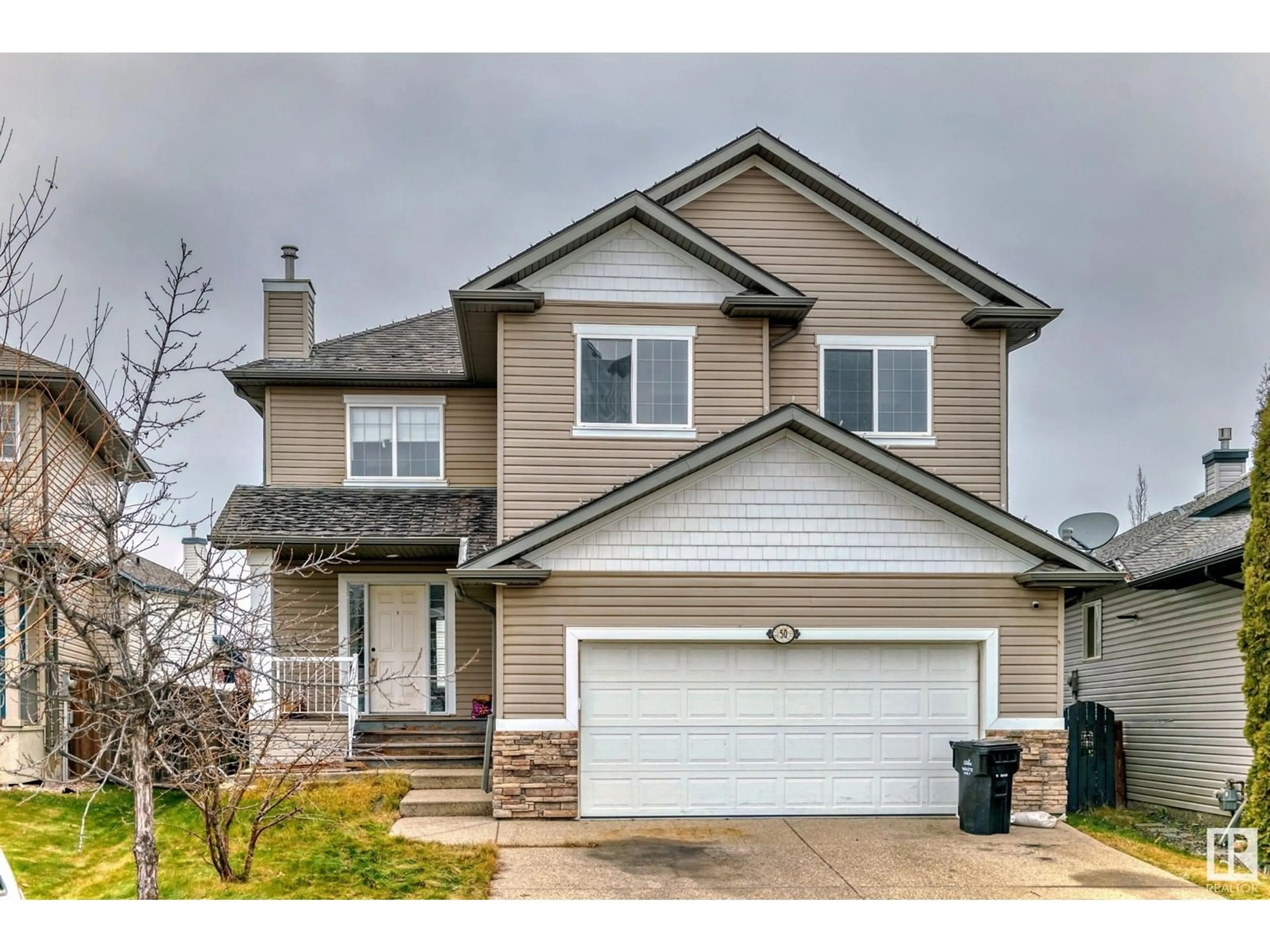 Frontside or backside of a home, the street view for 50 ACACIA LI, Leduc Alberta T9E0C8