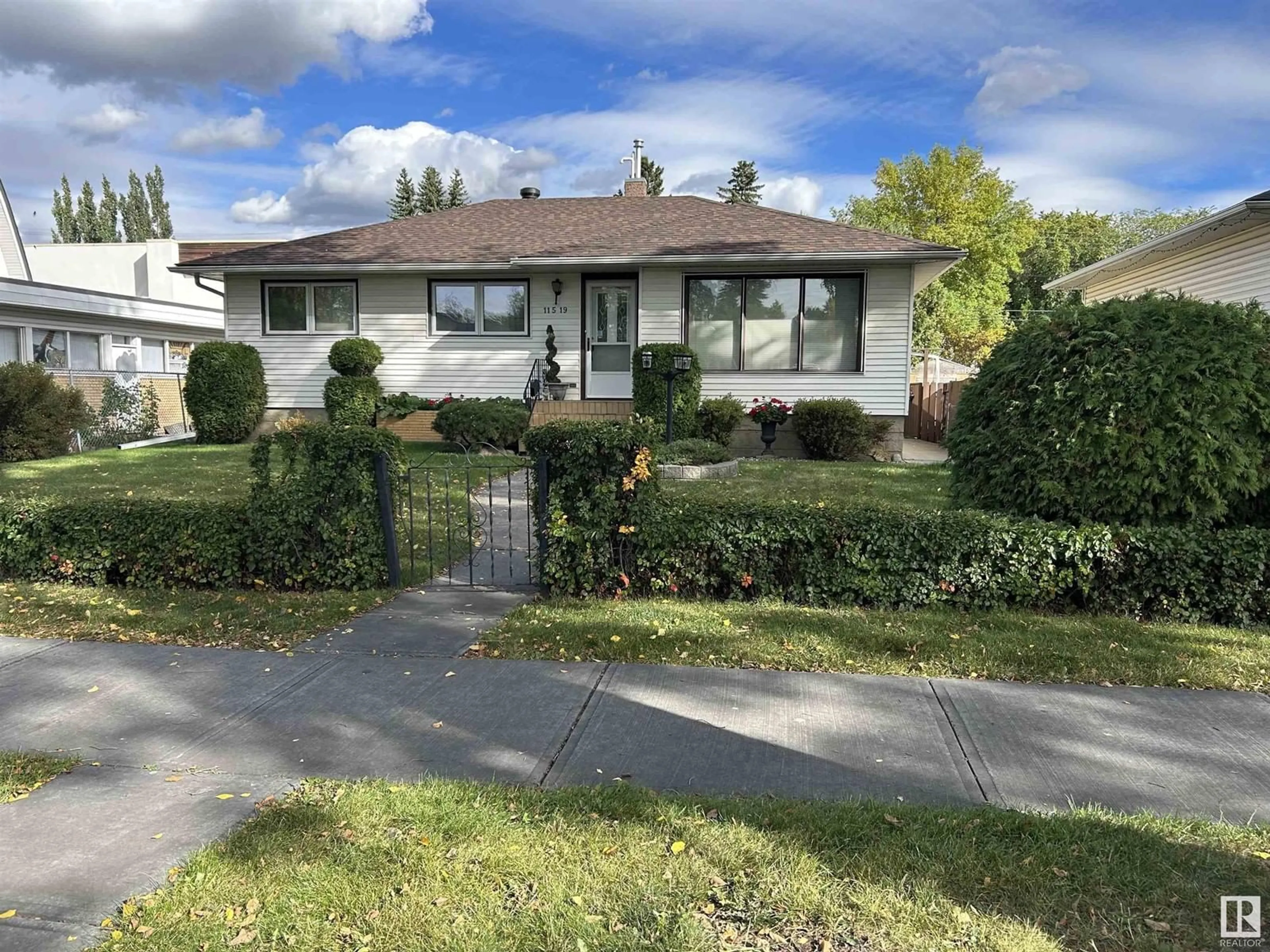 Frontside or backside of a home, the street view for 11519 135 ST NW, Edmonton Alberta T5M1K9