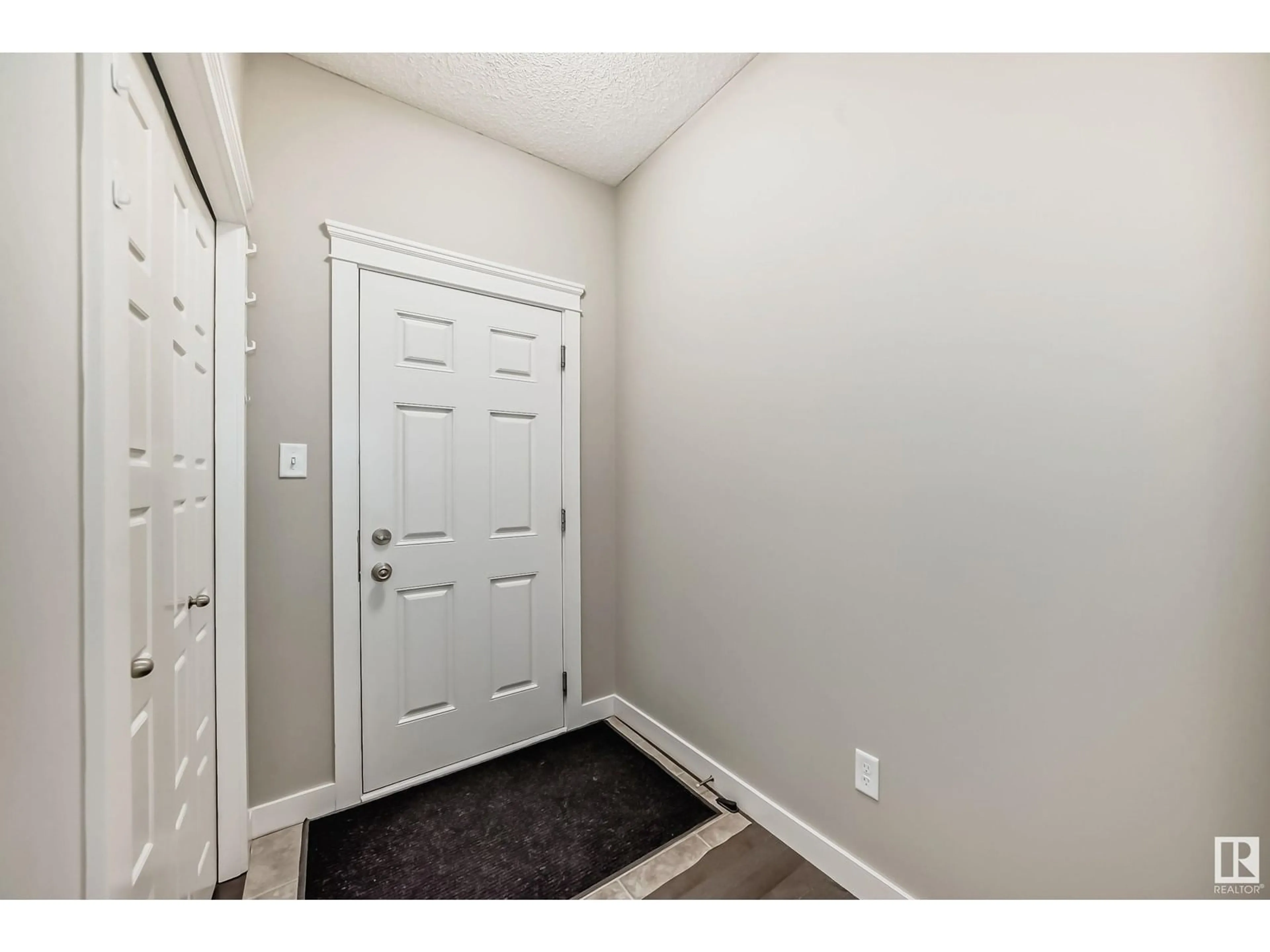 Indoor entryway, unknown floor for 3855 170 AV NW, Edmonton Alberta T5Y3S2