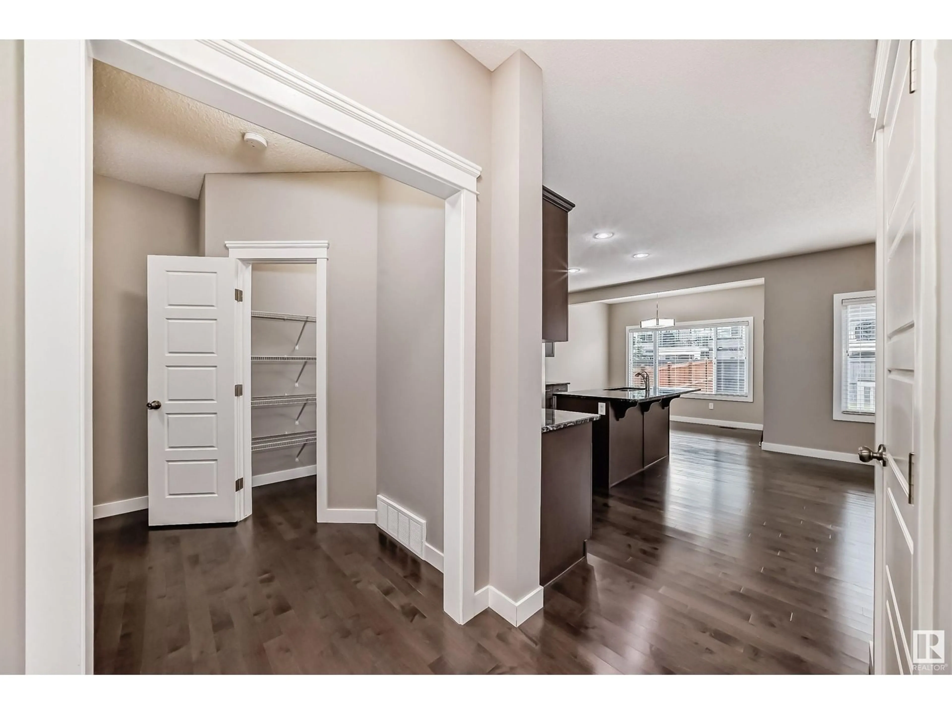 Indoor entryway, wood floors for 3855 170 AV NW, Edmonton Alberta T5Y3S2