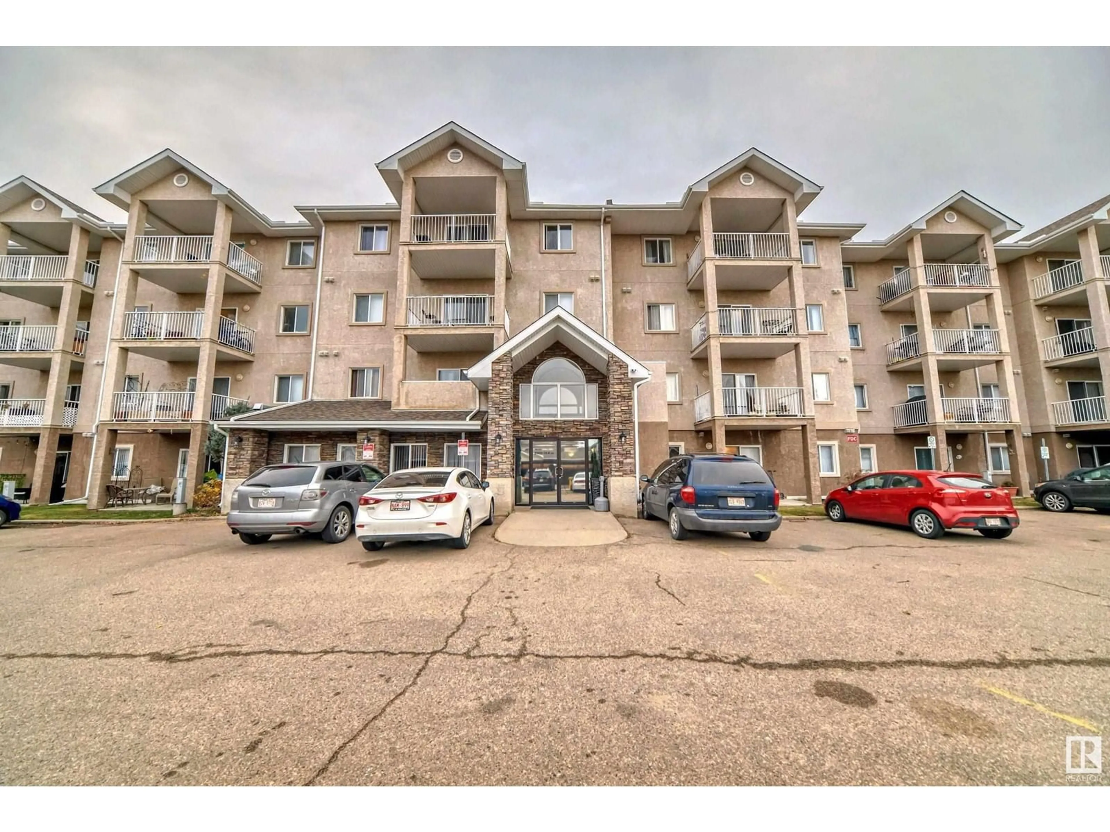 A pic from exterior of the house or condo, the front or back of building for #110 2305 35A AV NW, Edmonton Alberta T6T1Z2