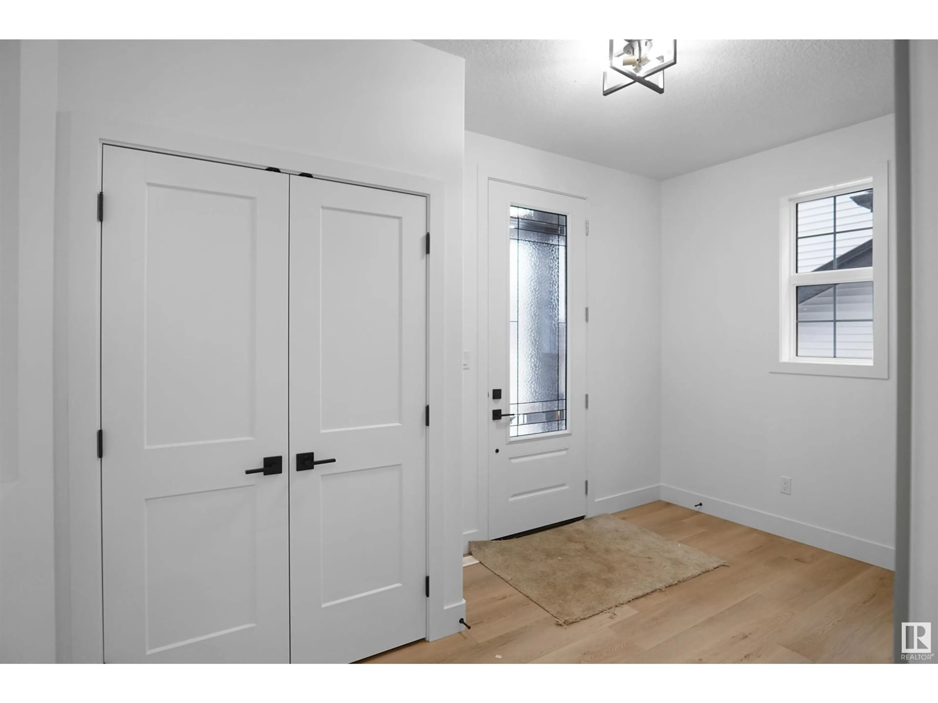 Indoor entryway, wood floors for 3508 6 ST NW, Edmonton Alberta T6T2L5