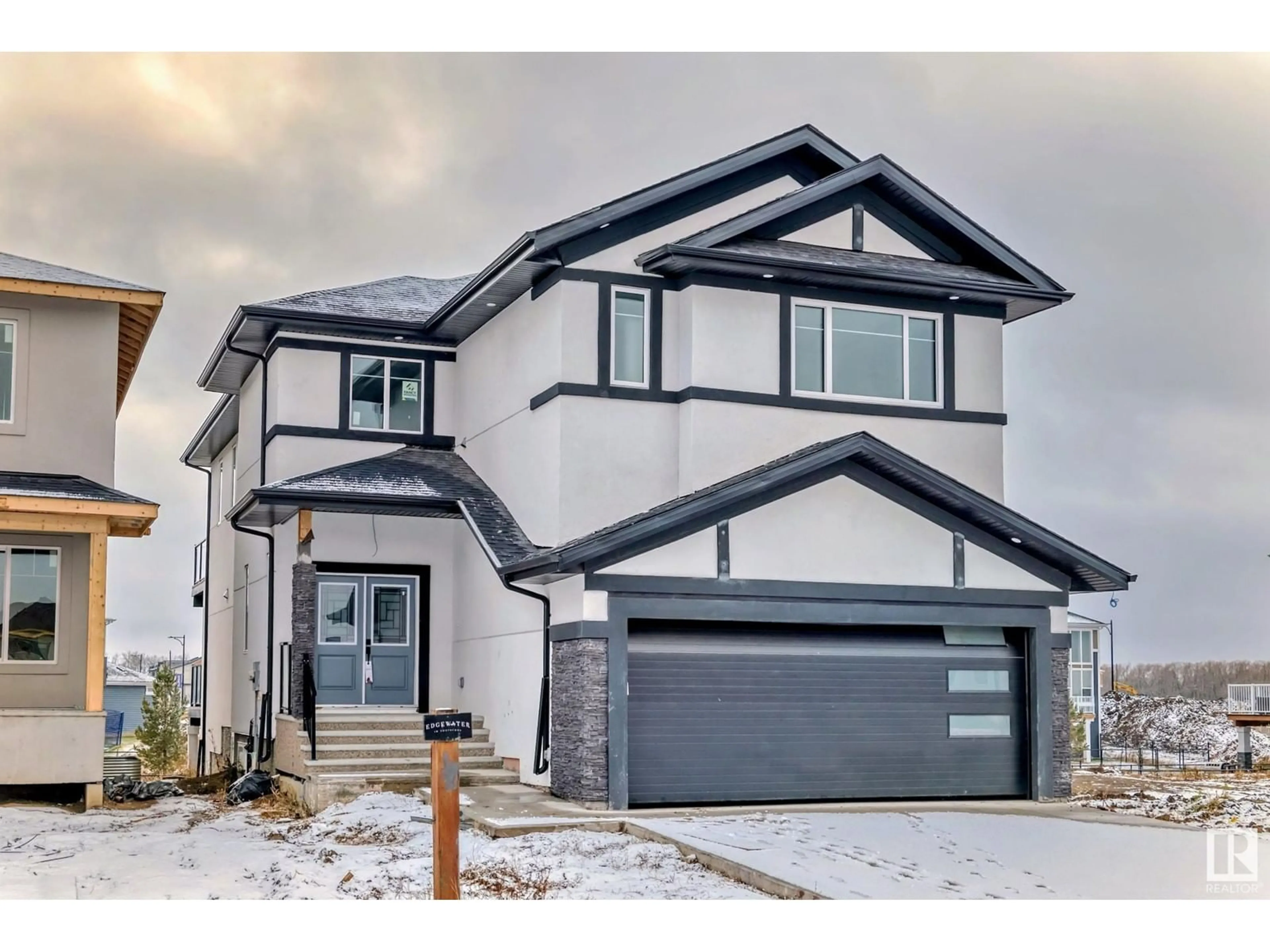 Frontside or backside of a home, the street view for 128 EDGEWATER CI, Leduc Alberta T9E1K5