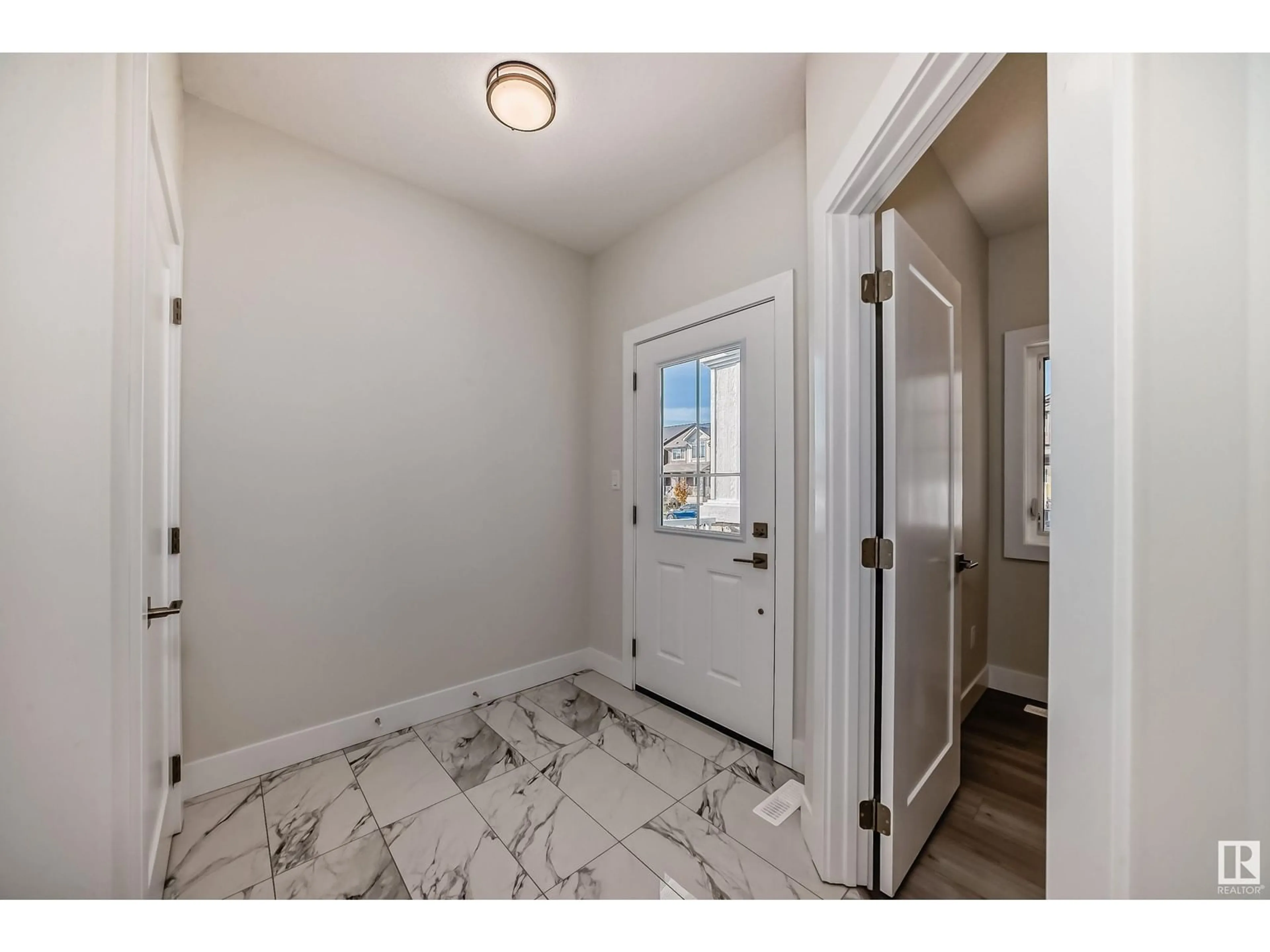 Indoor entryway, wood floors for 1325 ENRIGHT LANDING LD NW, Edmonton Alberta T6M0Z4