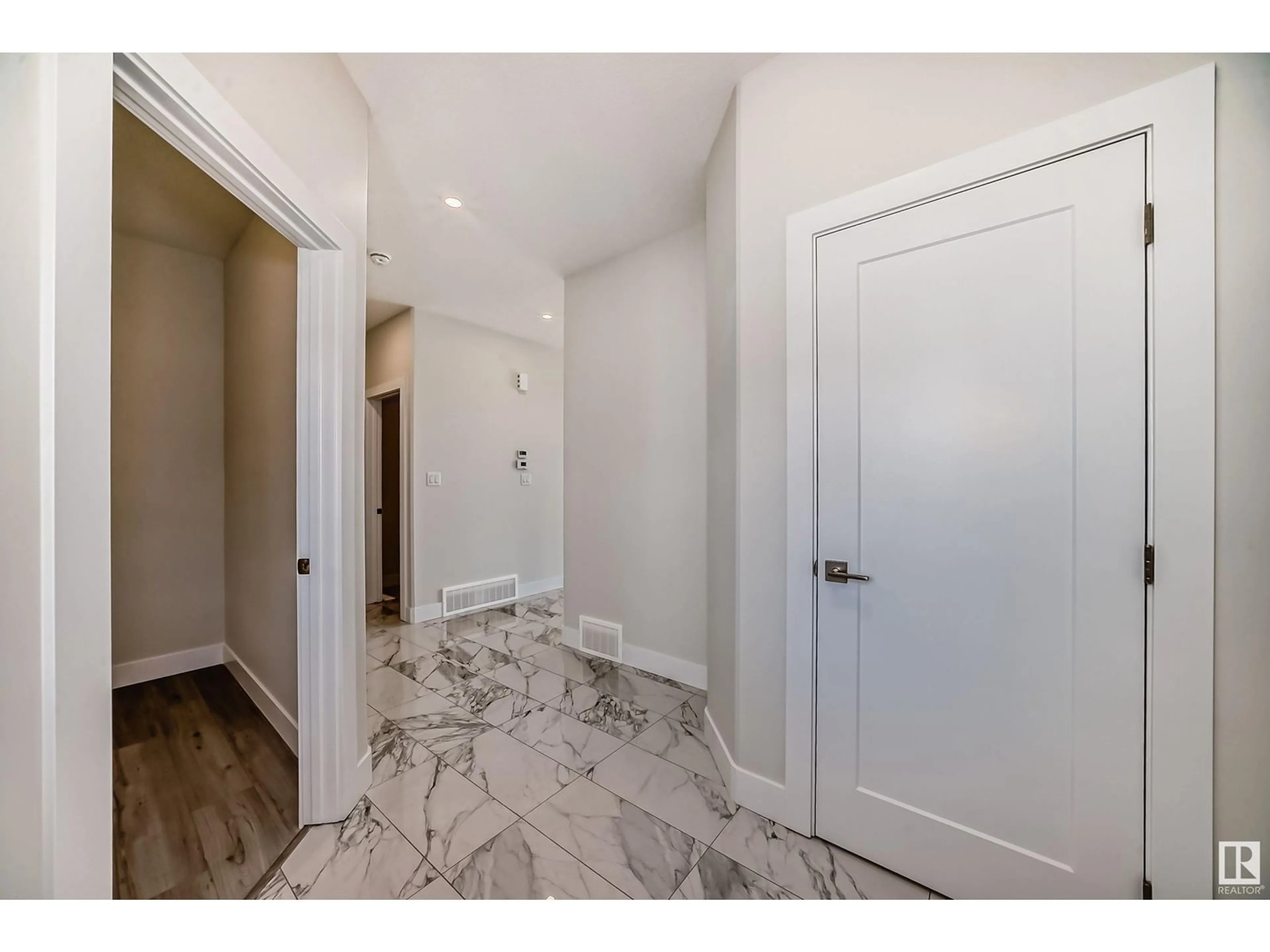 Indoor entryway, wood floors for 1325 ENRIGHT LANDING LD NW, Edmonton Alberta T6M0Z4