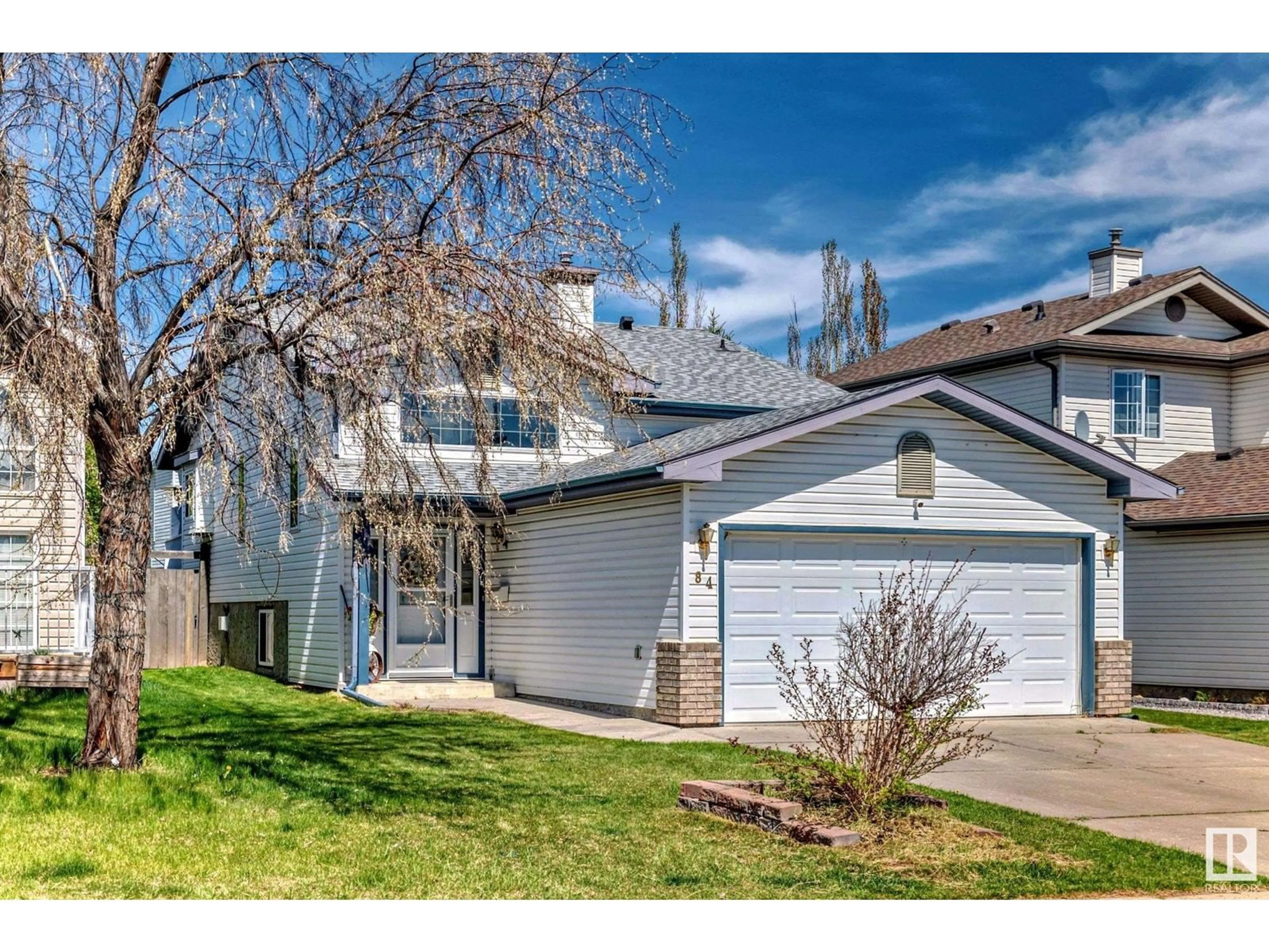 Frontside or backside of a home, the fenced backyard for 84 LANDSDOWNE DR, Spruce Grove Alberta T7X3Z8