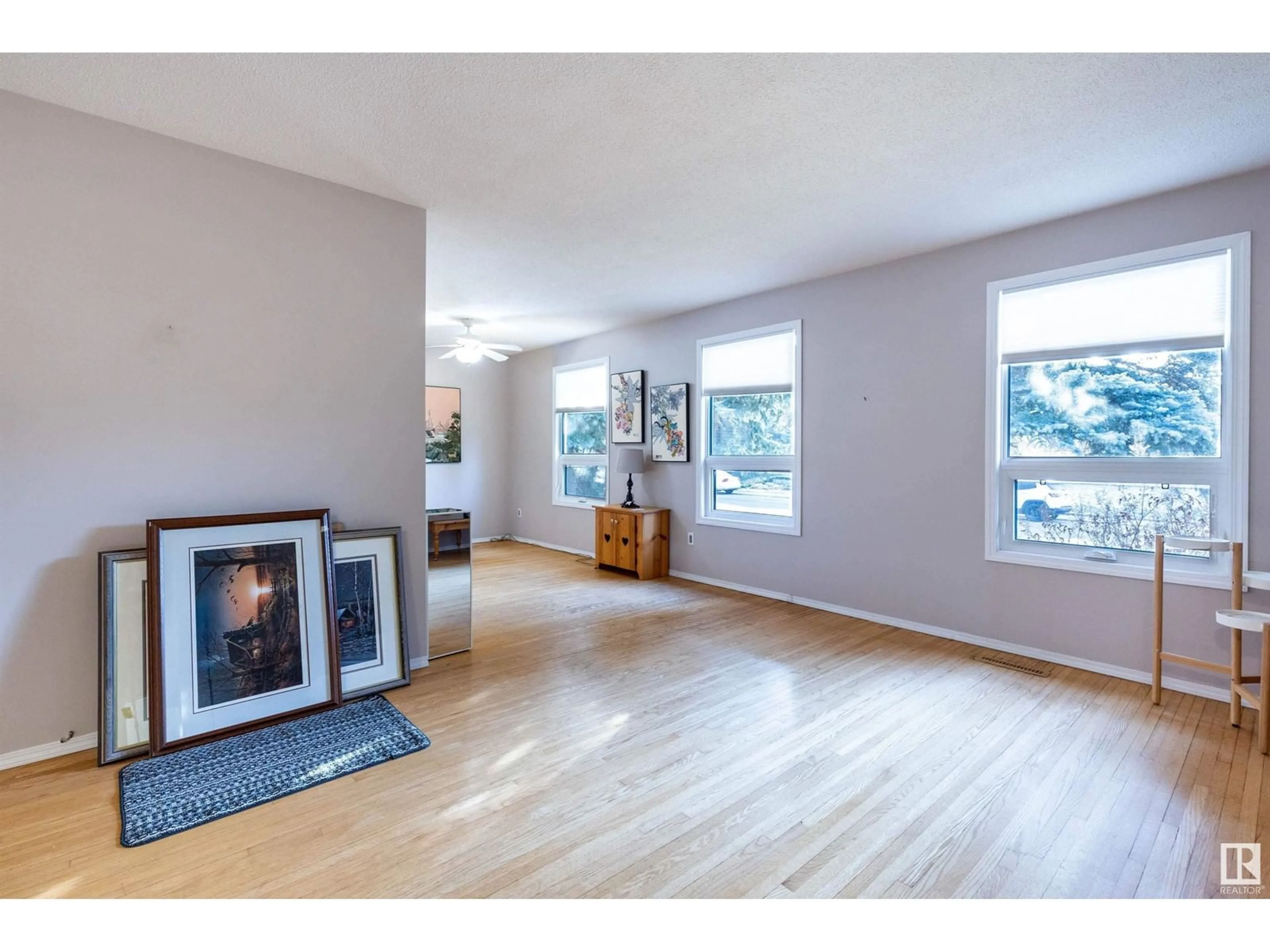 Living room, wood floors for 10948 37 AV NW NW, Edmonton Alberta T6J0G7