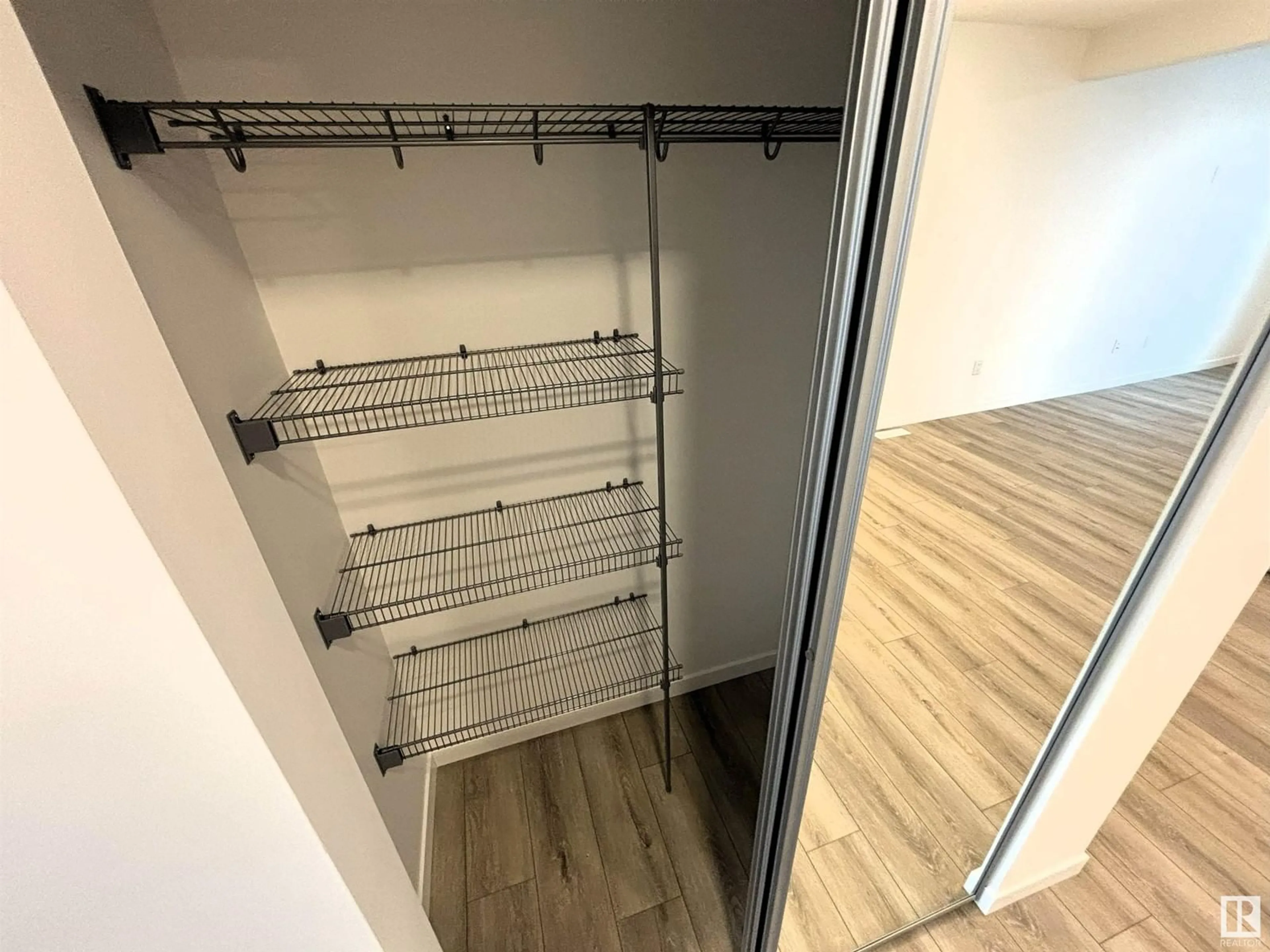 Storage room or clothes room or walk-in closet for #116 1025 SECORD PROMENADE NW, Edmonton Alberta T5T7V4