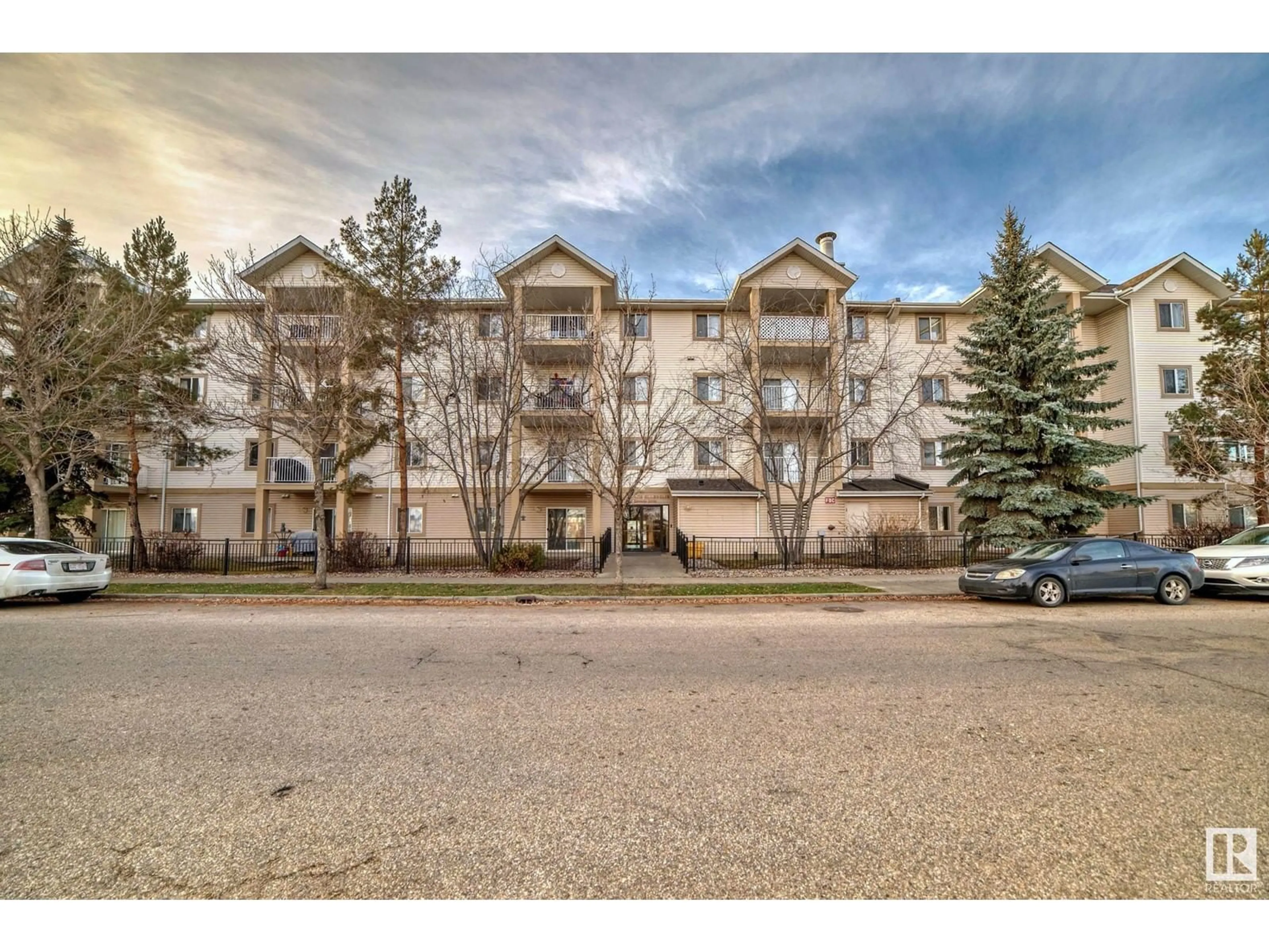 A pic from exterior of the house or condo, the street view for #212 245 EDWARDS DR SW, Edmonton Alberta T6X1J9