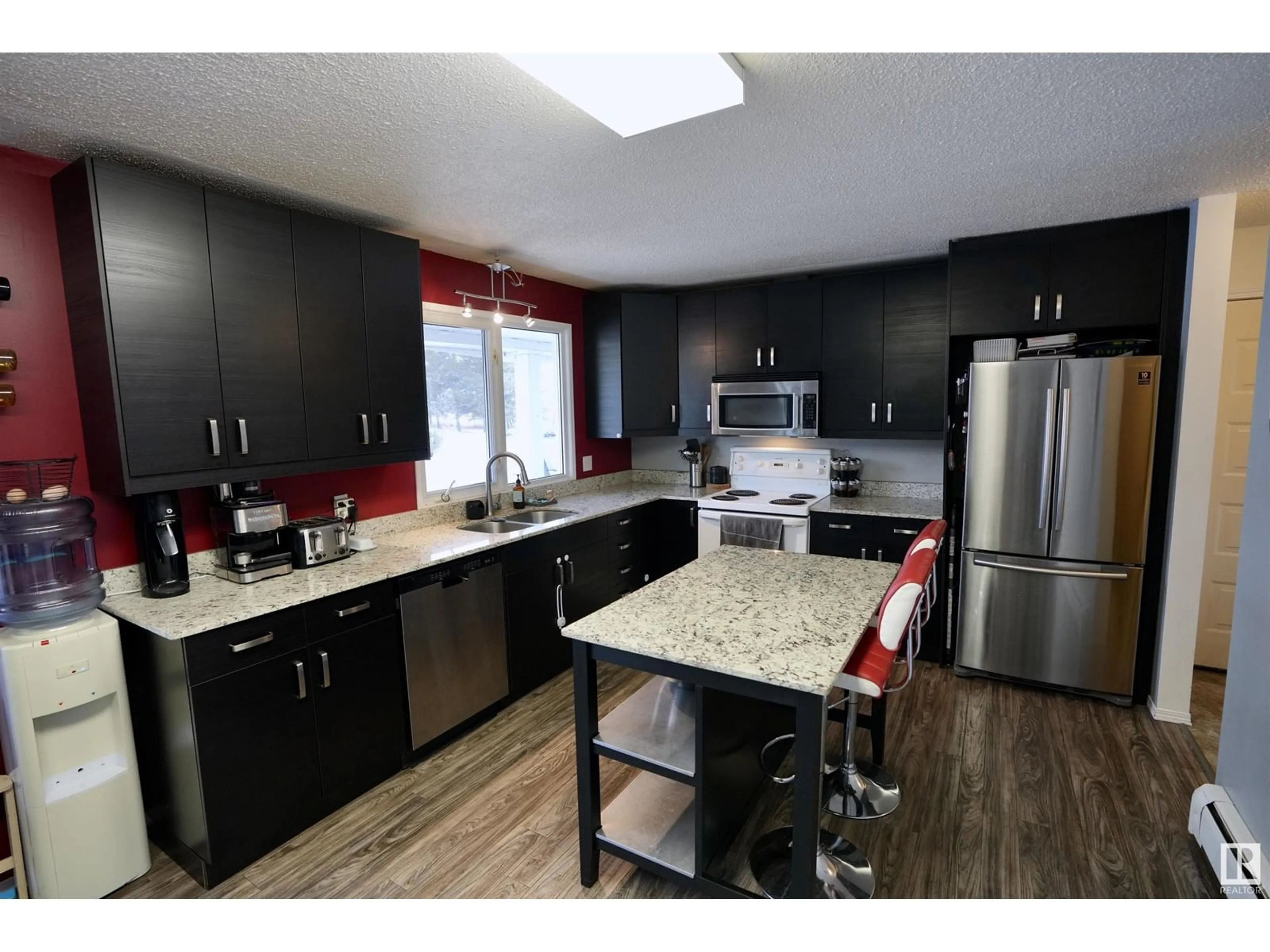 Open concept kitchen for 105 58114 RR 83, Rural St. Paul County Alberta T0A3A0