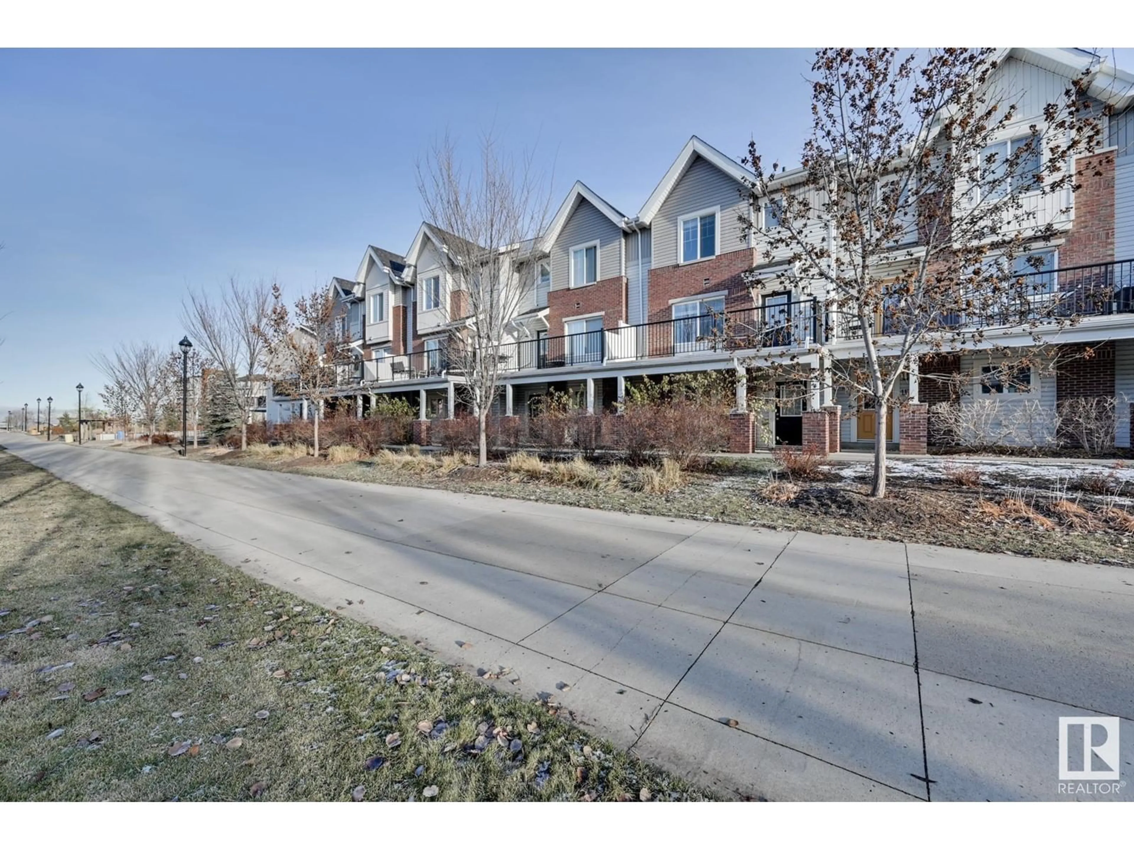 A pic from exterior of the house or condo, the street view for #115 2336 ASPEN TR, Sherwood Park Alberta T8H0J1