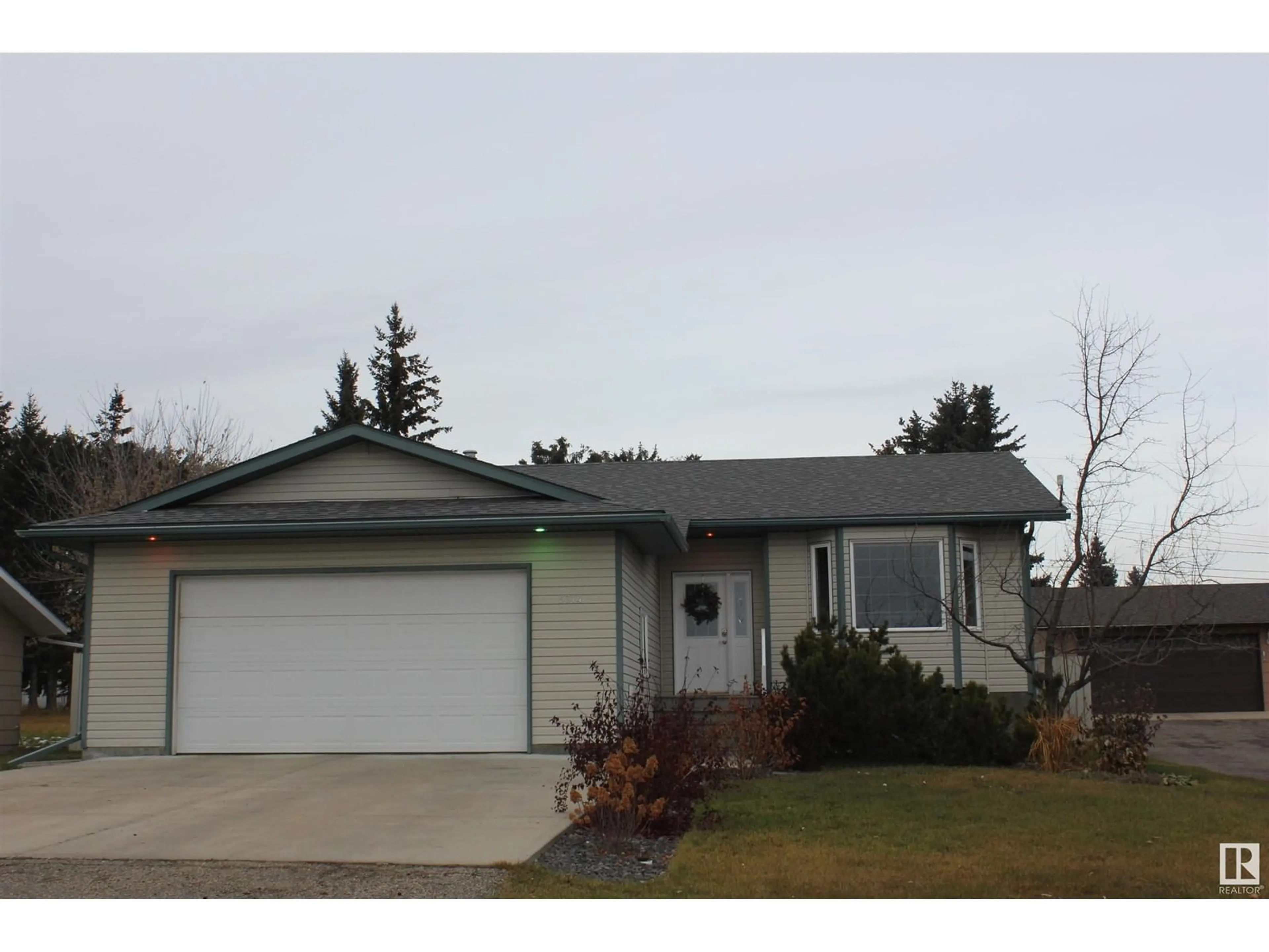 Home with vinyl exterior material, street for 5314 52 AV, Elk Point Alberta T0A1A0