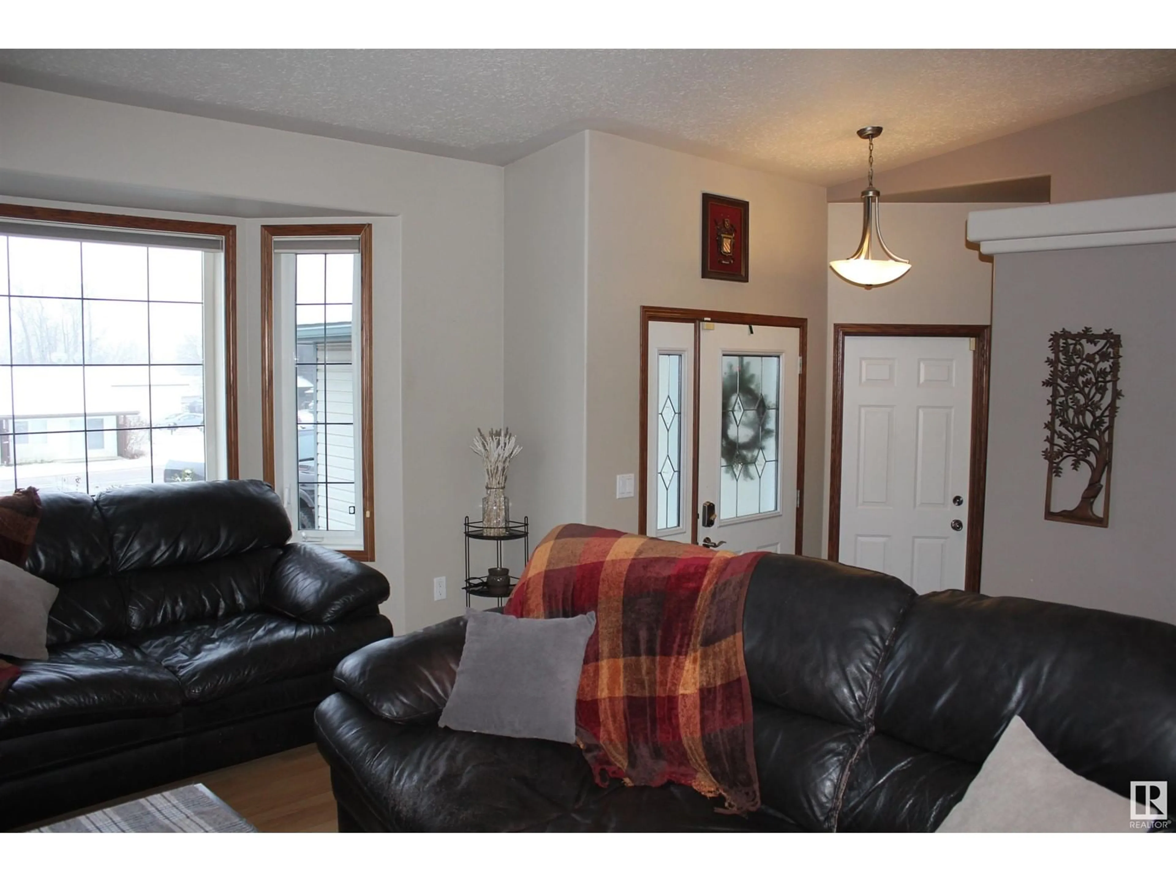 Living room with furniture, wood/laminate floor for 5314 52 AV, Elk Point Alberta T0A1A0