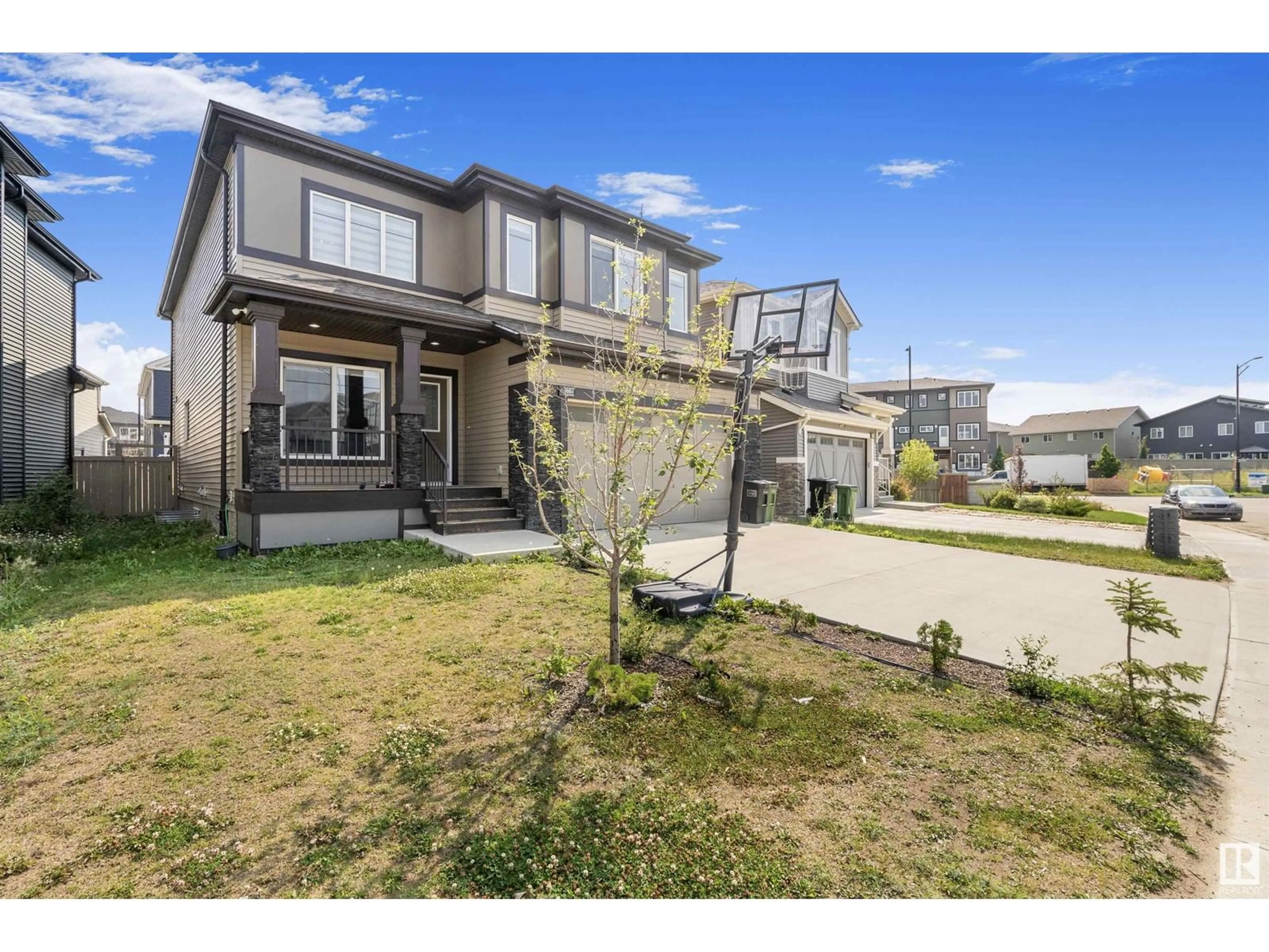 Frontside or backside of a home, the fenced backyard for 8607 MAYDAY WD SW, Edmonton Alberta T6X2L3