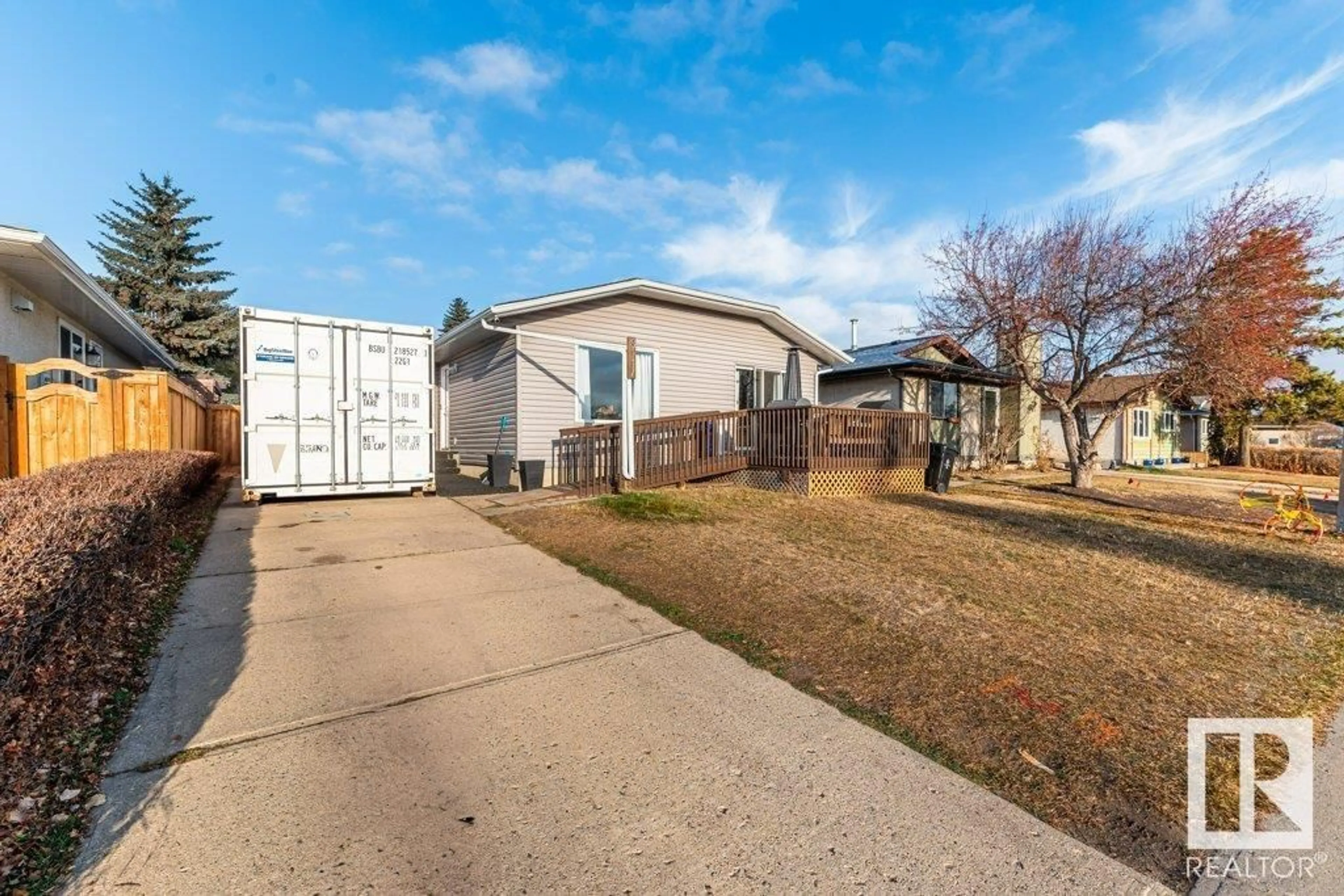 A pic from exterior of the house or condo, the fenced backyard for 8114 92A AV, Fort Saskatchewan Alberta T8L3M8