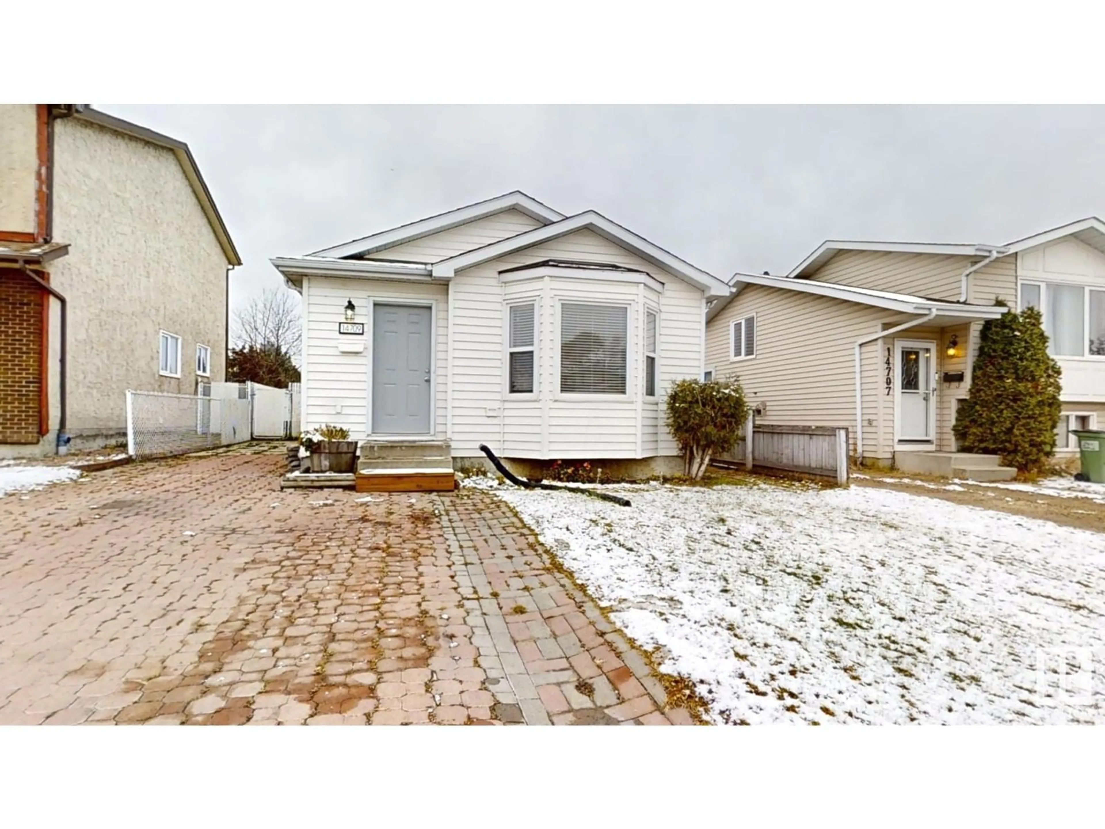 Frontside or backside of a home, cottage for 14709 37 St NW, Edmonton Alberta T5Y2K1