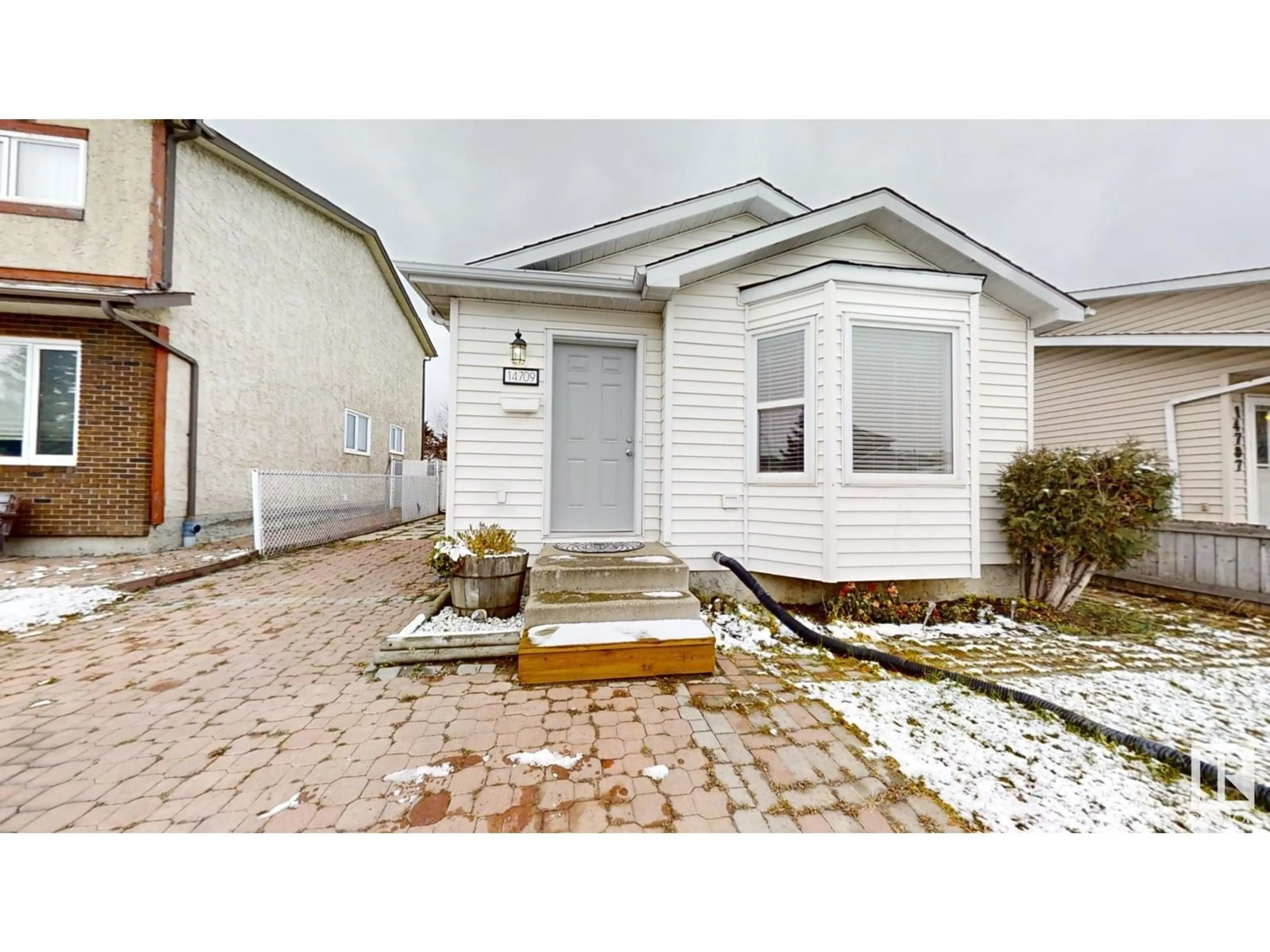 Frontside or backside of a home, cottage for 14709 37 St NW, Edmonton Alberta T5Y2K1