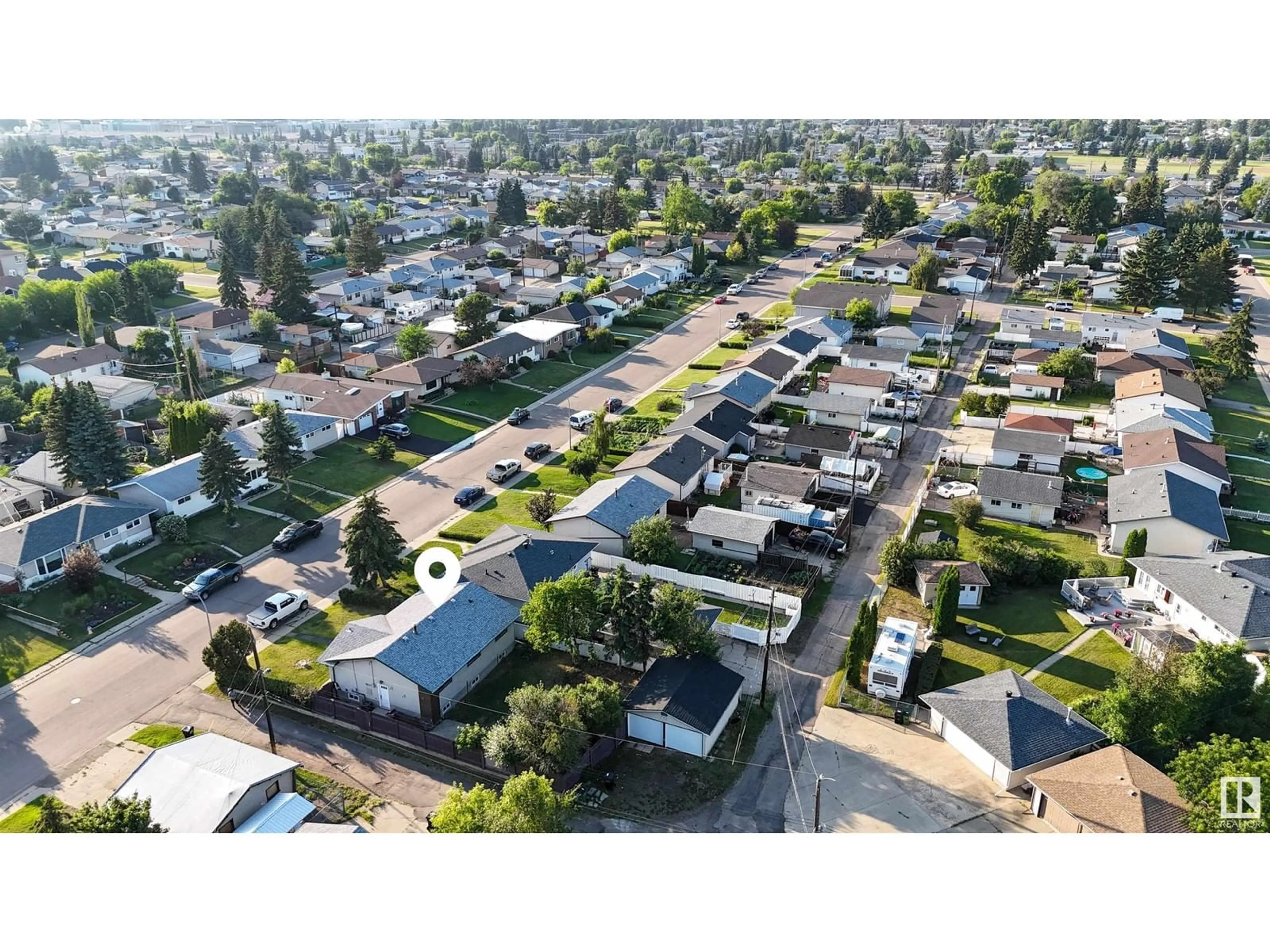 Frontside or backside of a home, the street view for 13411 61 ST NW, Edmonton Alberta T5A0T4