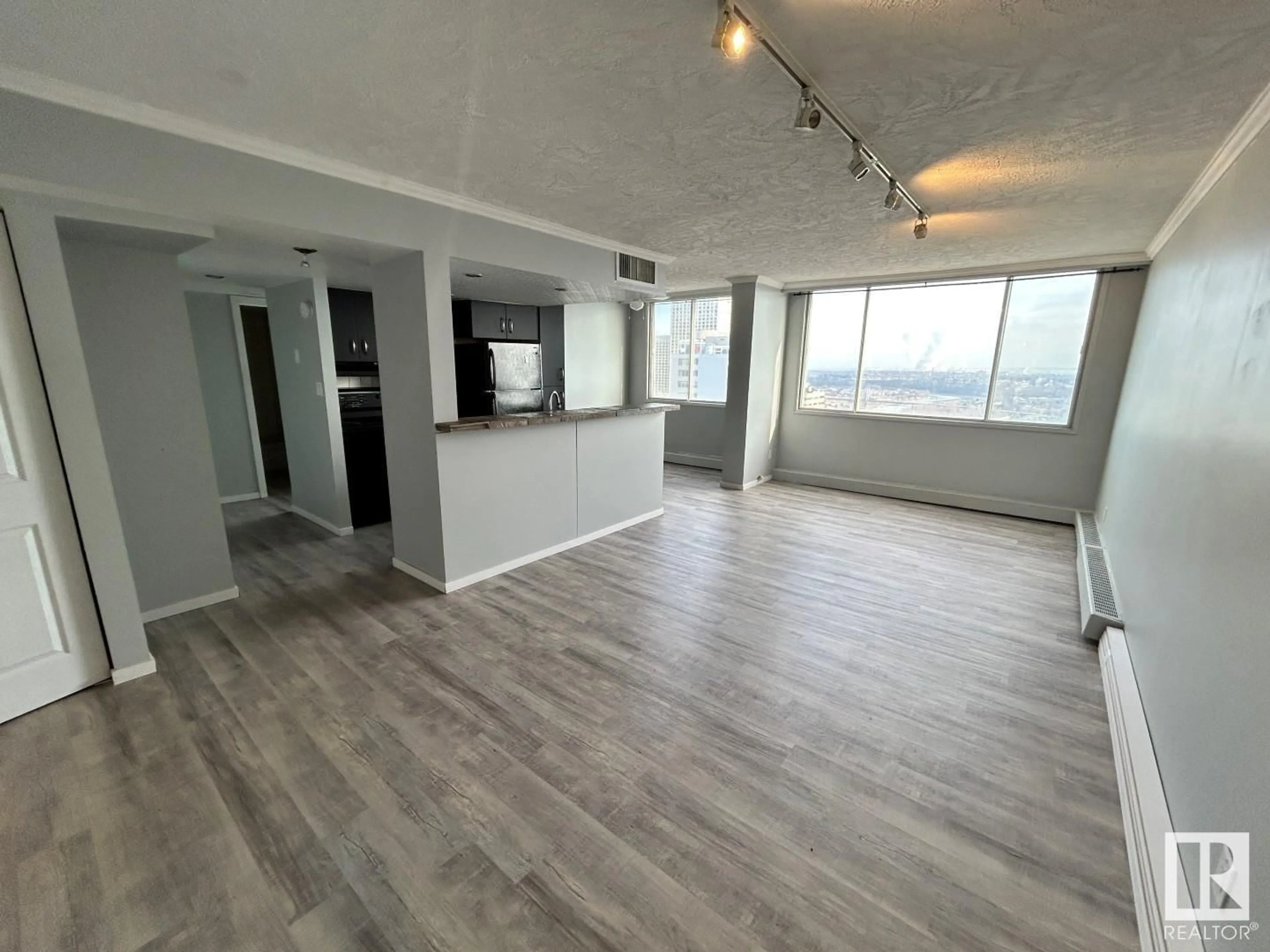 A pic of a room, wood floors for #2205 9909 104 ST NW, Edmonton Alberta T5K2G5