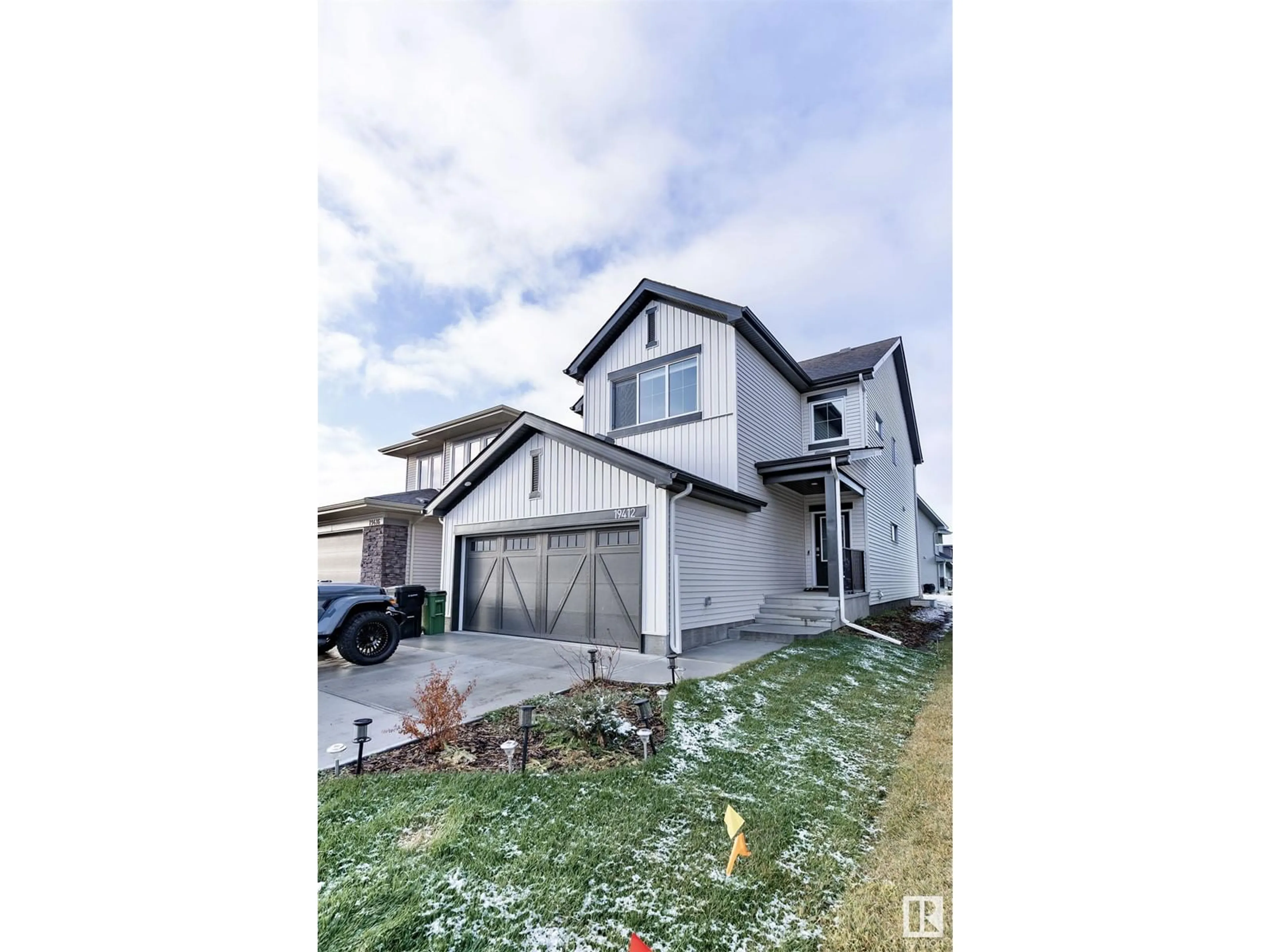 Frontside or backside of a home, the street view for 19412 25 AV NW, Edmonton Alberta T6M1P5