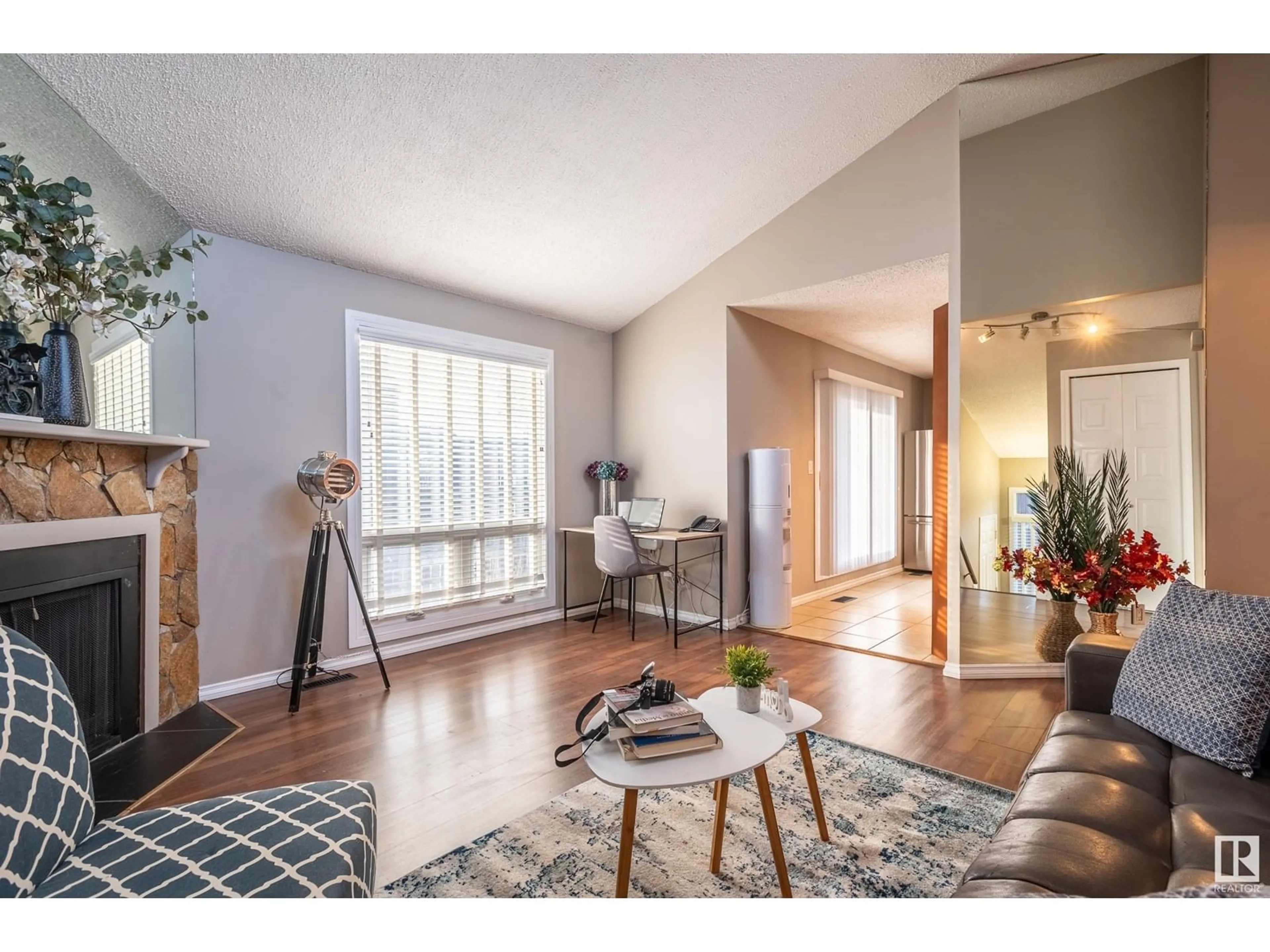 Indoor entryway, wood floors for 14167 26 ST NW, Edmonton Alberta T5Y1S2