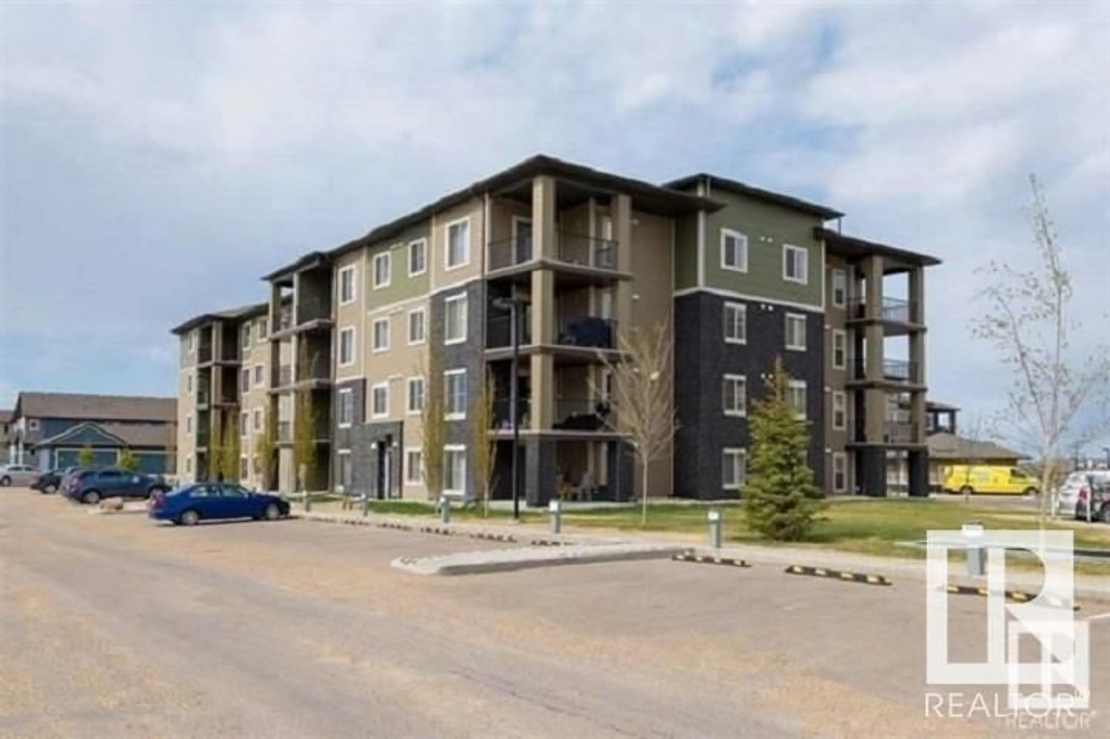 A pic from exterior of the house or condo, the front or back of building for #311 111 WATT CM SW, Edmonton Alberta T6X2C6