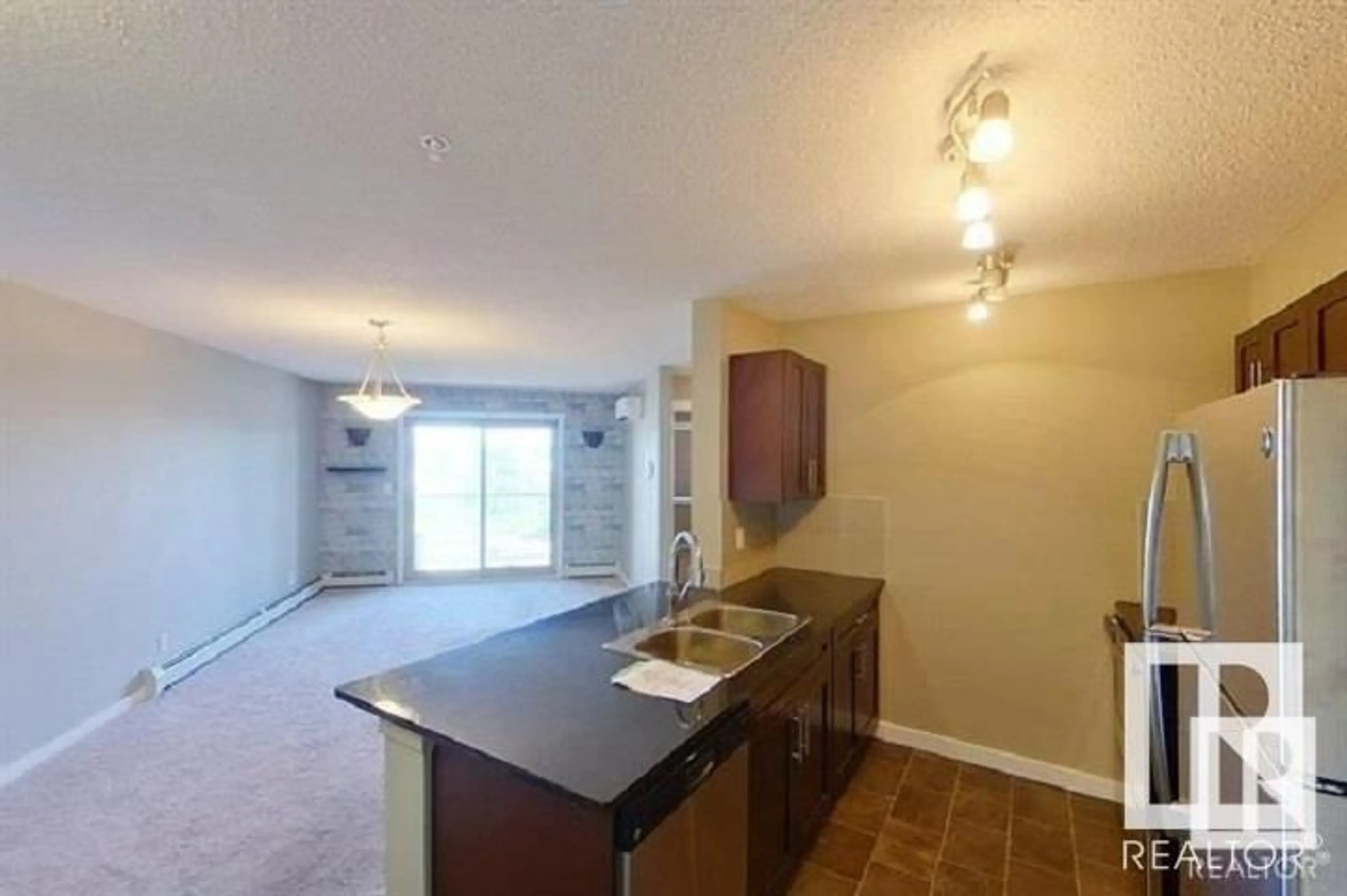 Open concept kitchen for #311 111 WATT CM SW, Edmonton Alberta T6X2C6