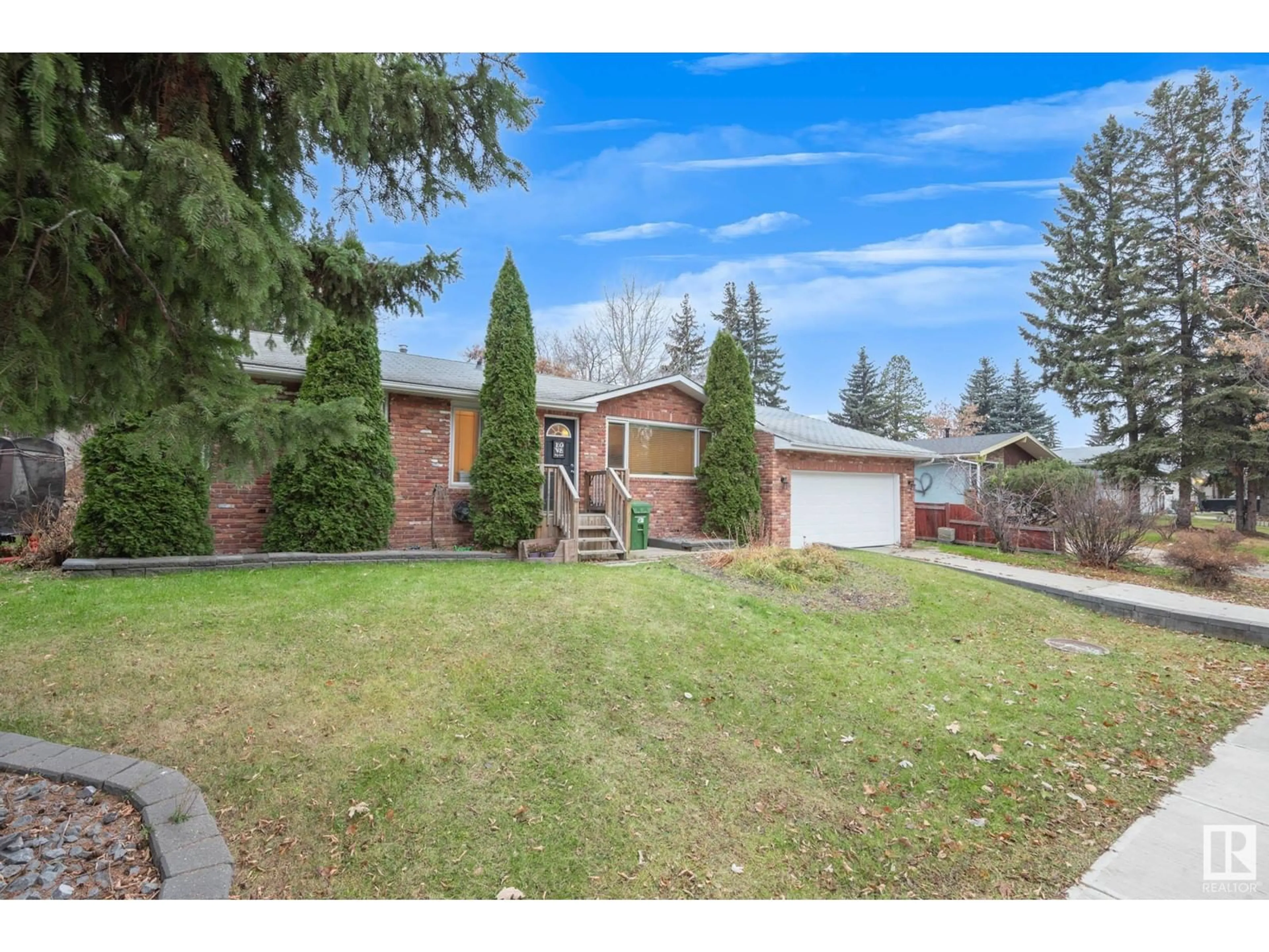 Frontside or backside of a home, the fenced backyard for 17 SPRUCE CR, St. Albert Alberta T8N0H4