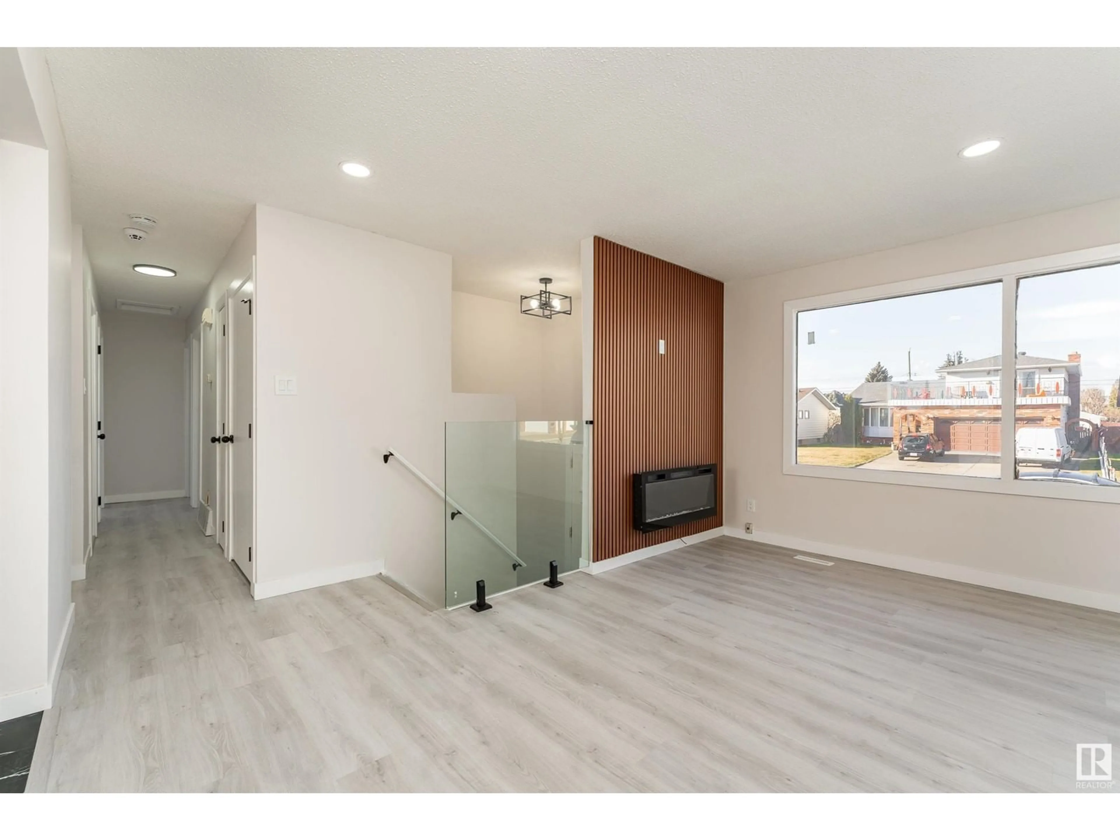 Indoor entryway, wood floors for 12431 51 ST NW, Edmonton Alberta T5W3H4