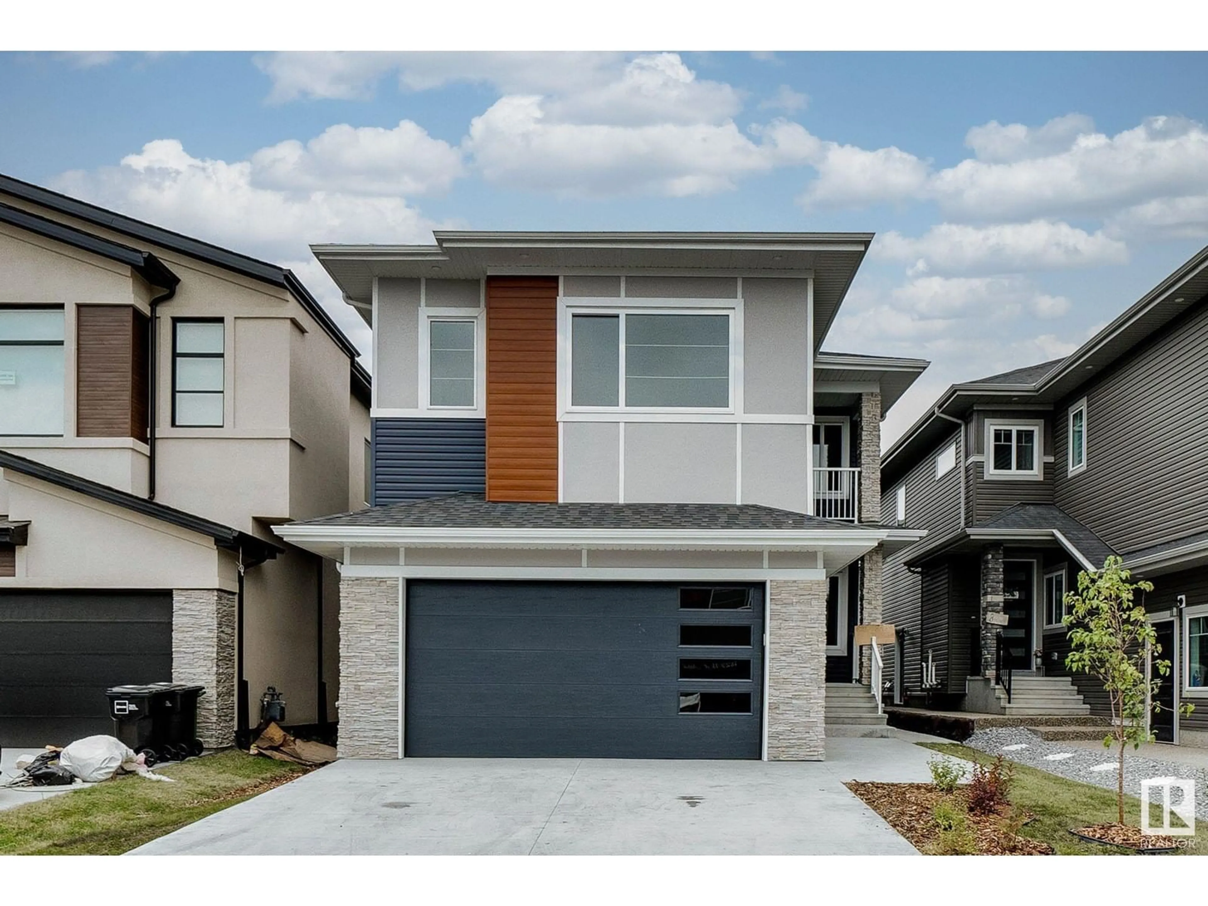 Home with vinyl exterior material, street for 1826 18A AV NW, Edmonton Alberta T6T0K3