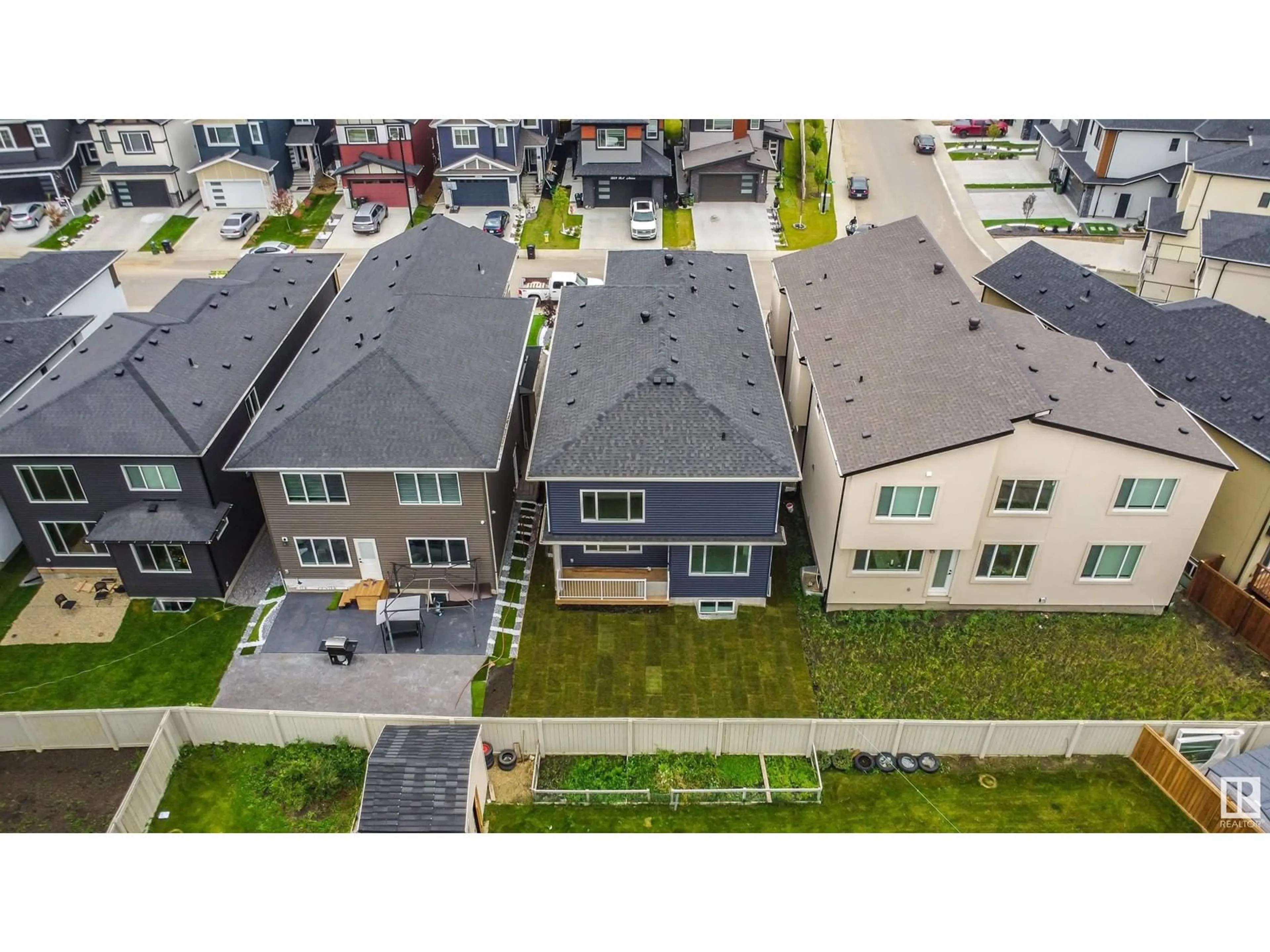 A pic from outside/outdoor area/front of a property/back of a property/a pic from drone, street for 1826 18A AV NW, Edmonton Alberta T6T0K3