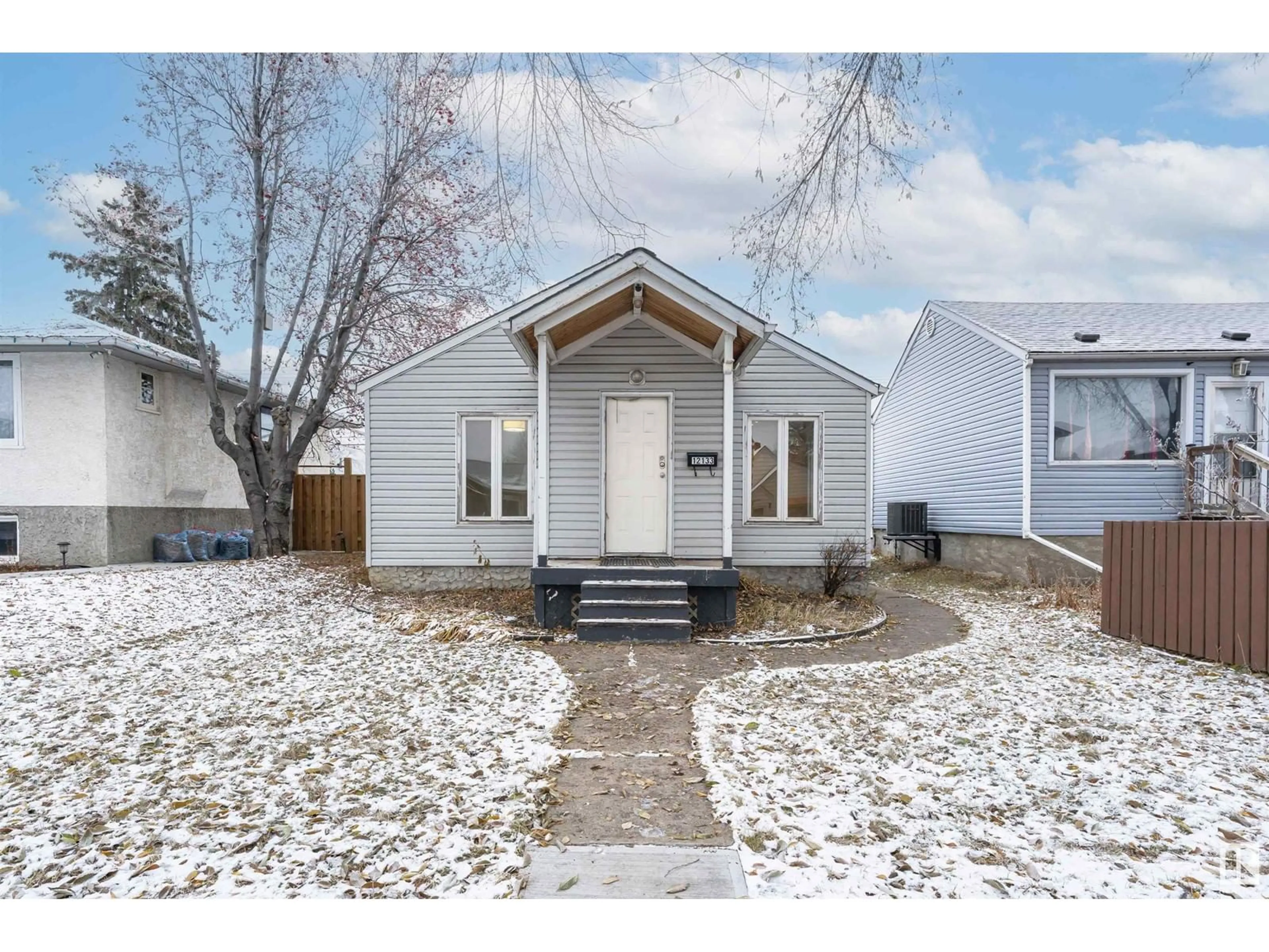 Frontside or backside of a home, cottage for 12133 91 St NW, Edmonton Alberta T5B4C2