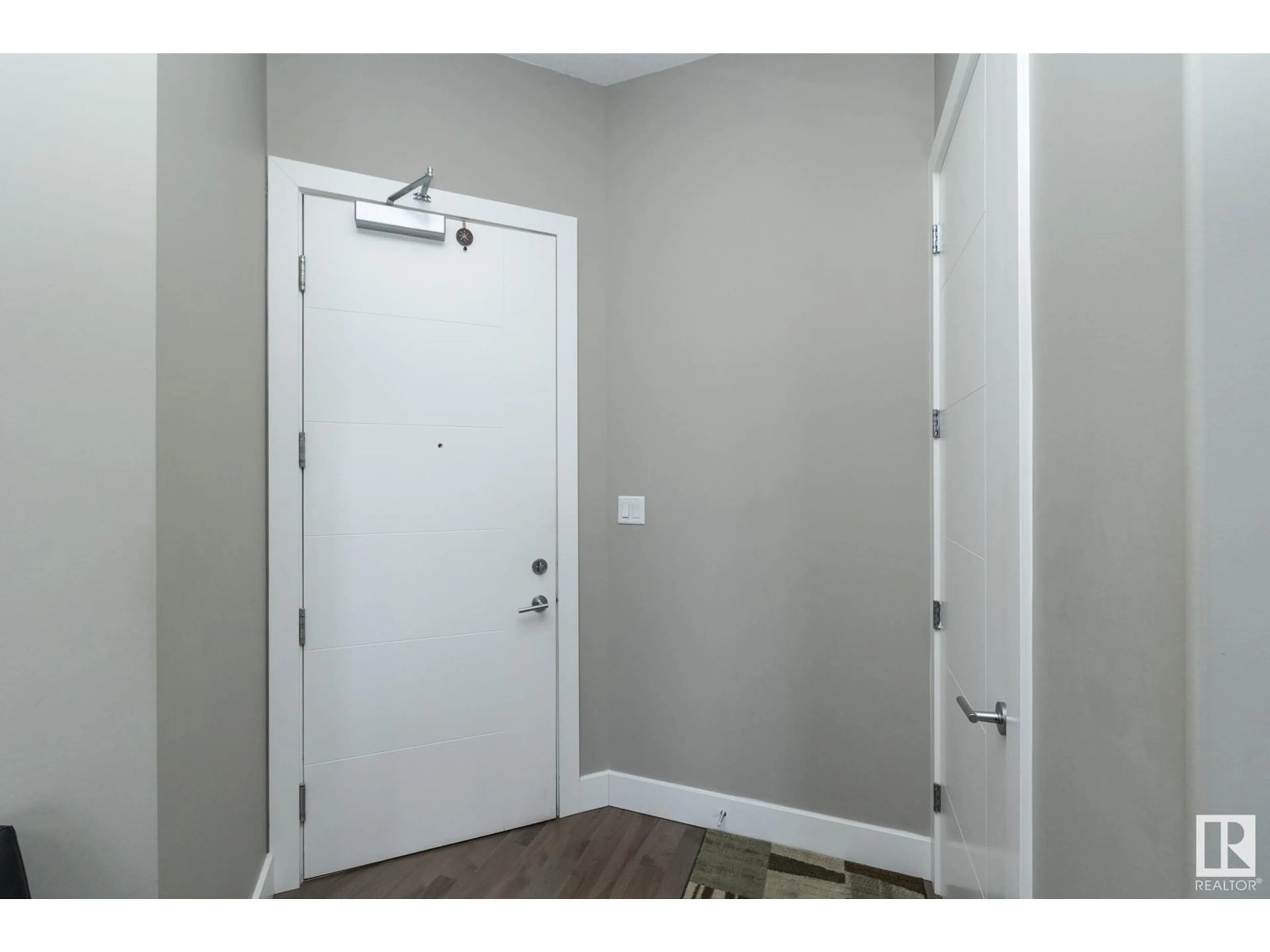 Indoor entryway, wood floors for #618 11080 Ellerslie RD SW, Edmonton Alberta T6W2C2