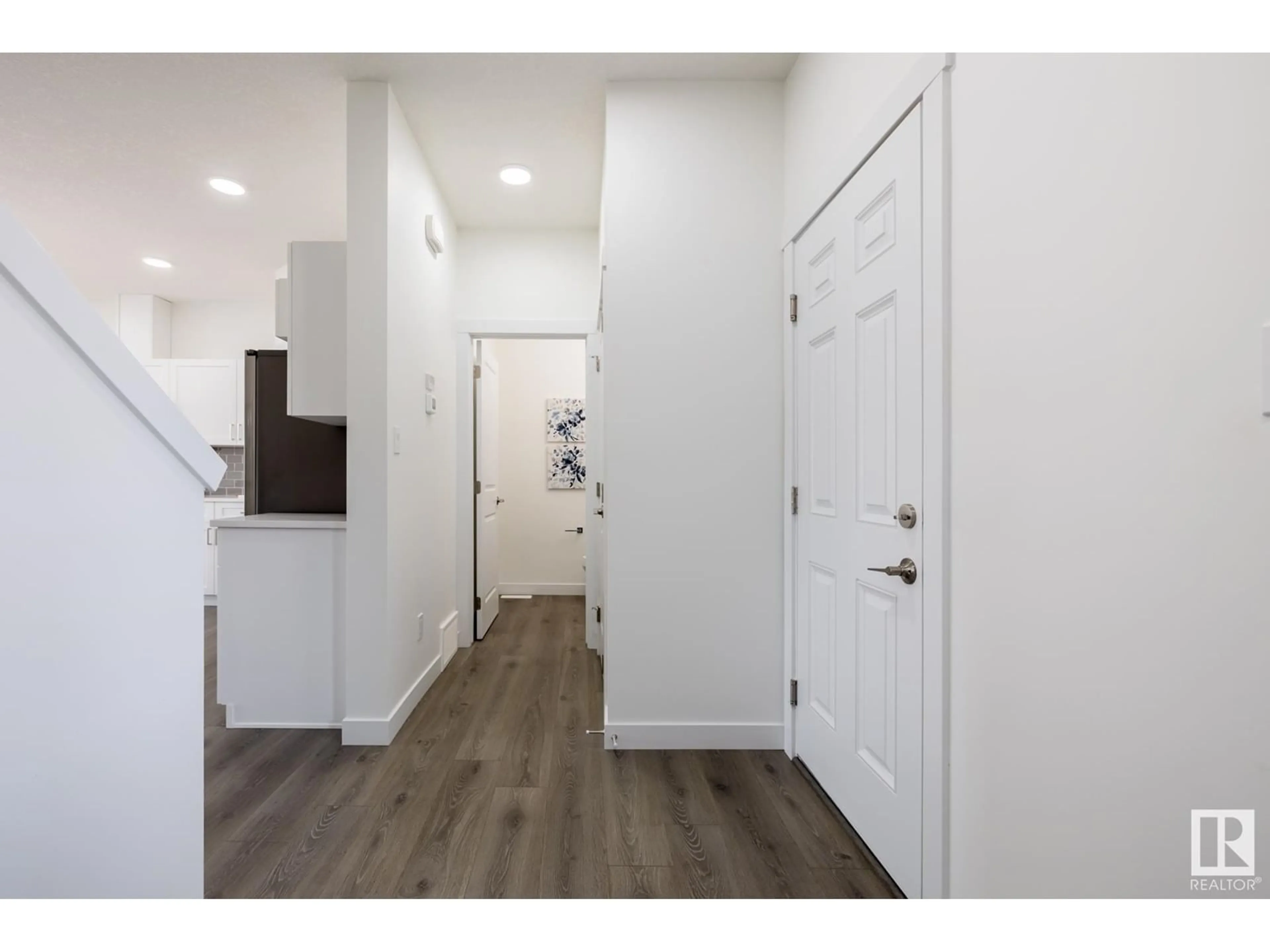 Indoor entryway, wood floors for 5240 Kinney PL SW, Edmonton Alberta T6W1A8