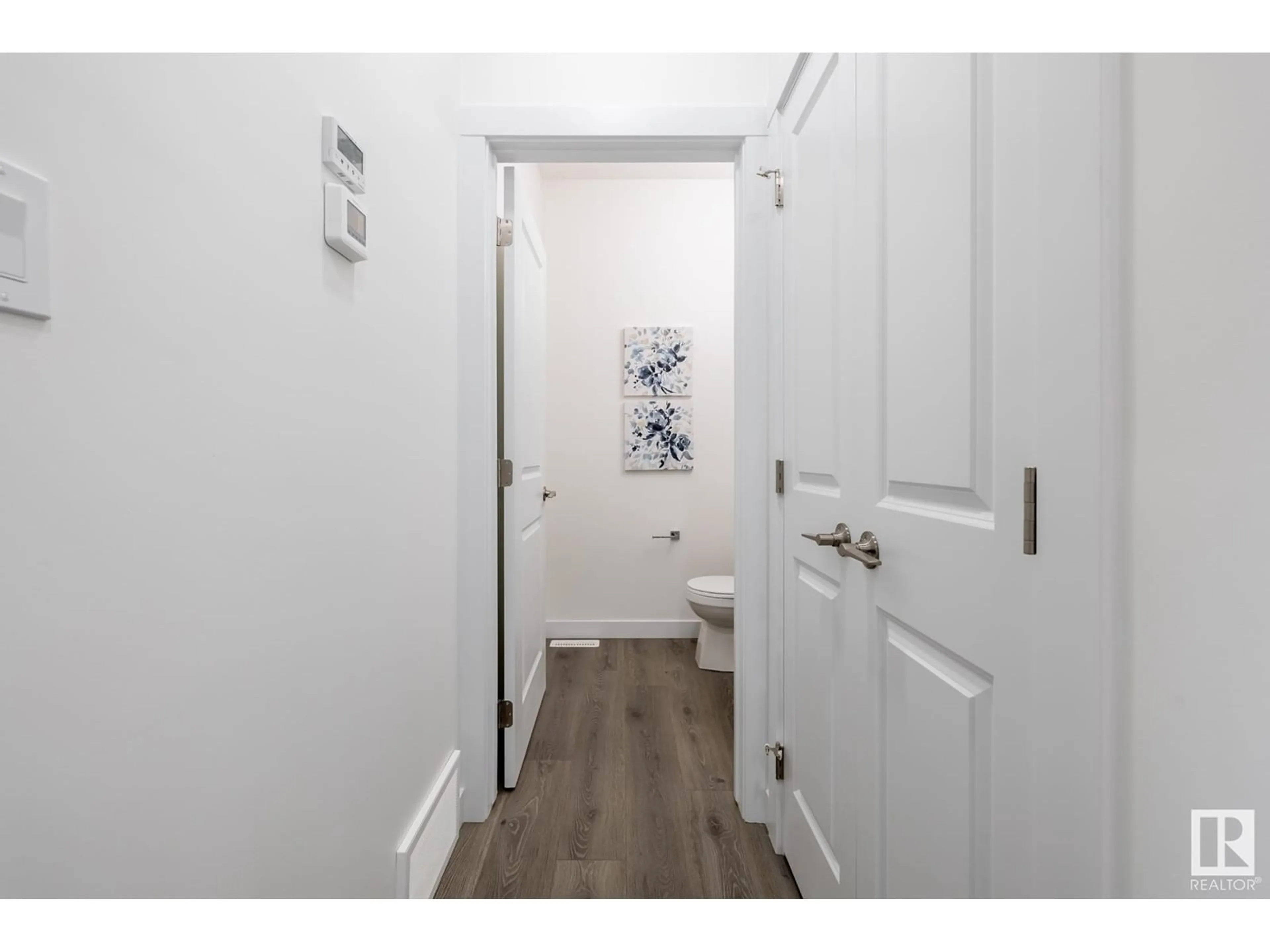 Indoor entryway, wood floors for 5240 Kinney PL SW, Edmonton Alberta T6W1A8