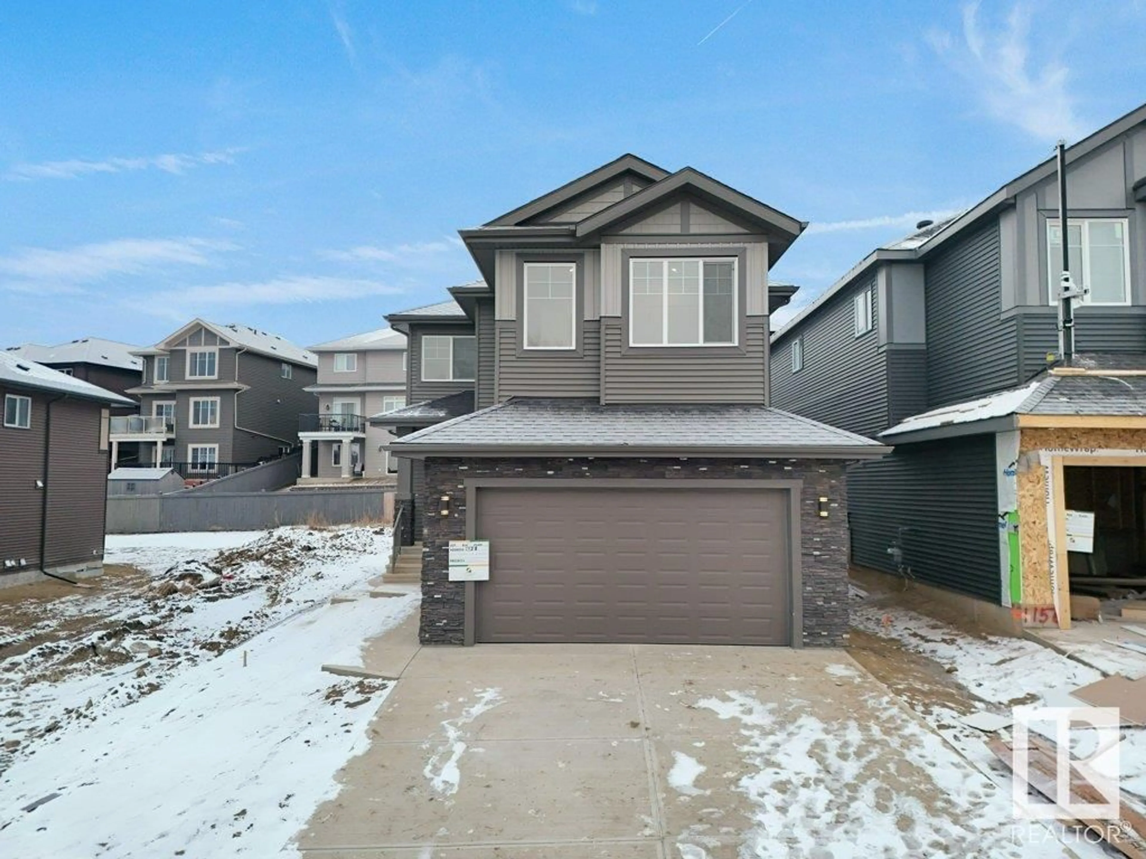 Frontside or backside of a home, the street view for 1158 GYRFALCON CR NW, Edmonton Alberta T5S0S1