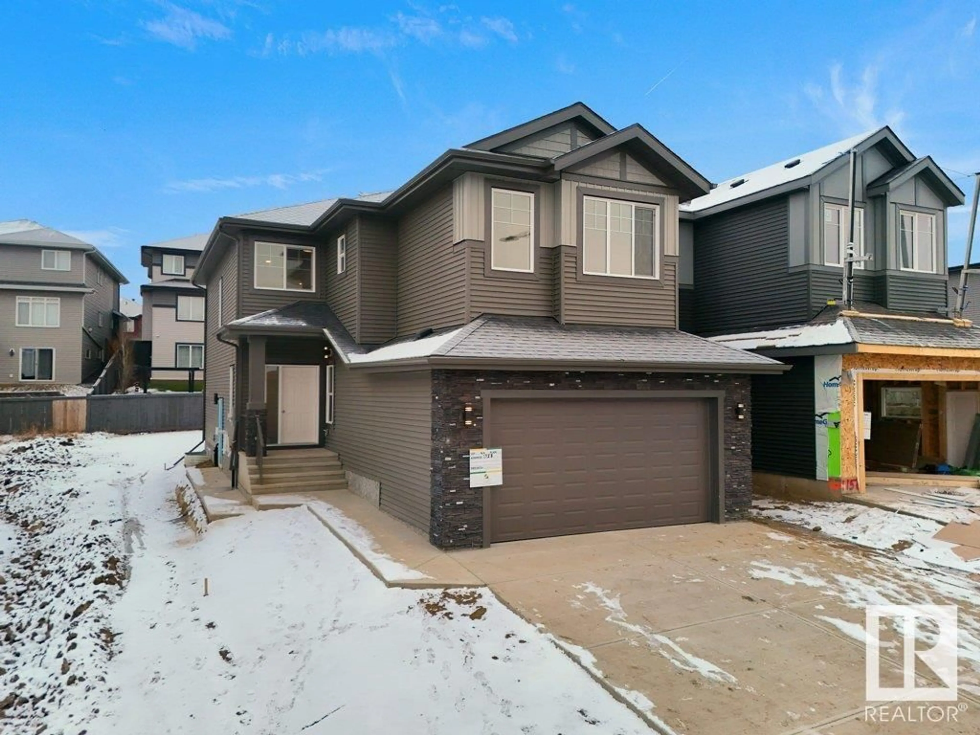 Frontside or backside of a home, the street view for 1158 GYRFALCON CR NW, Edmonton Alberta T5S0S1