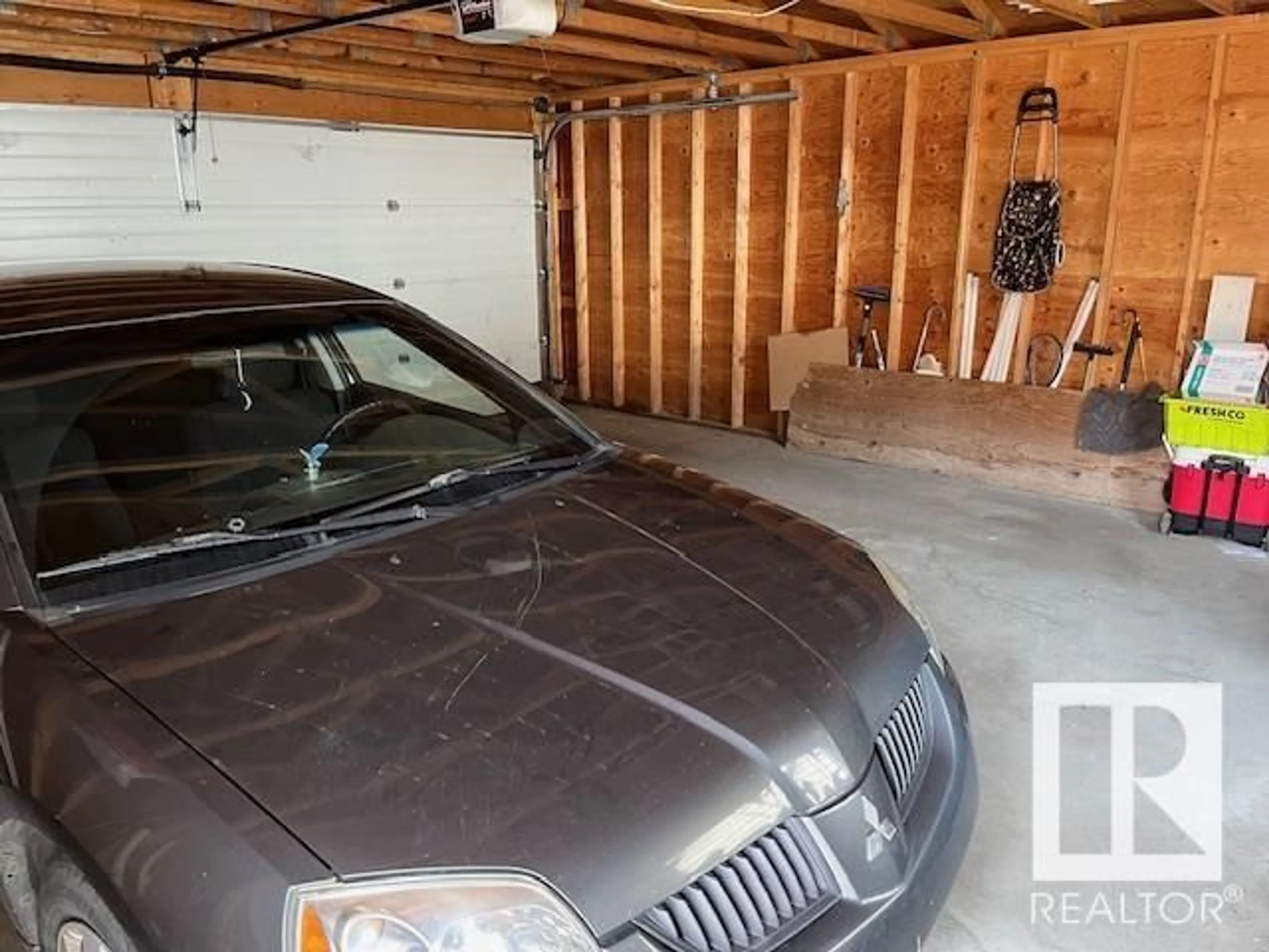 Indoor garage, cement floor for 10545 67 AV NW, Edmonton Alberta T6H1Z4