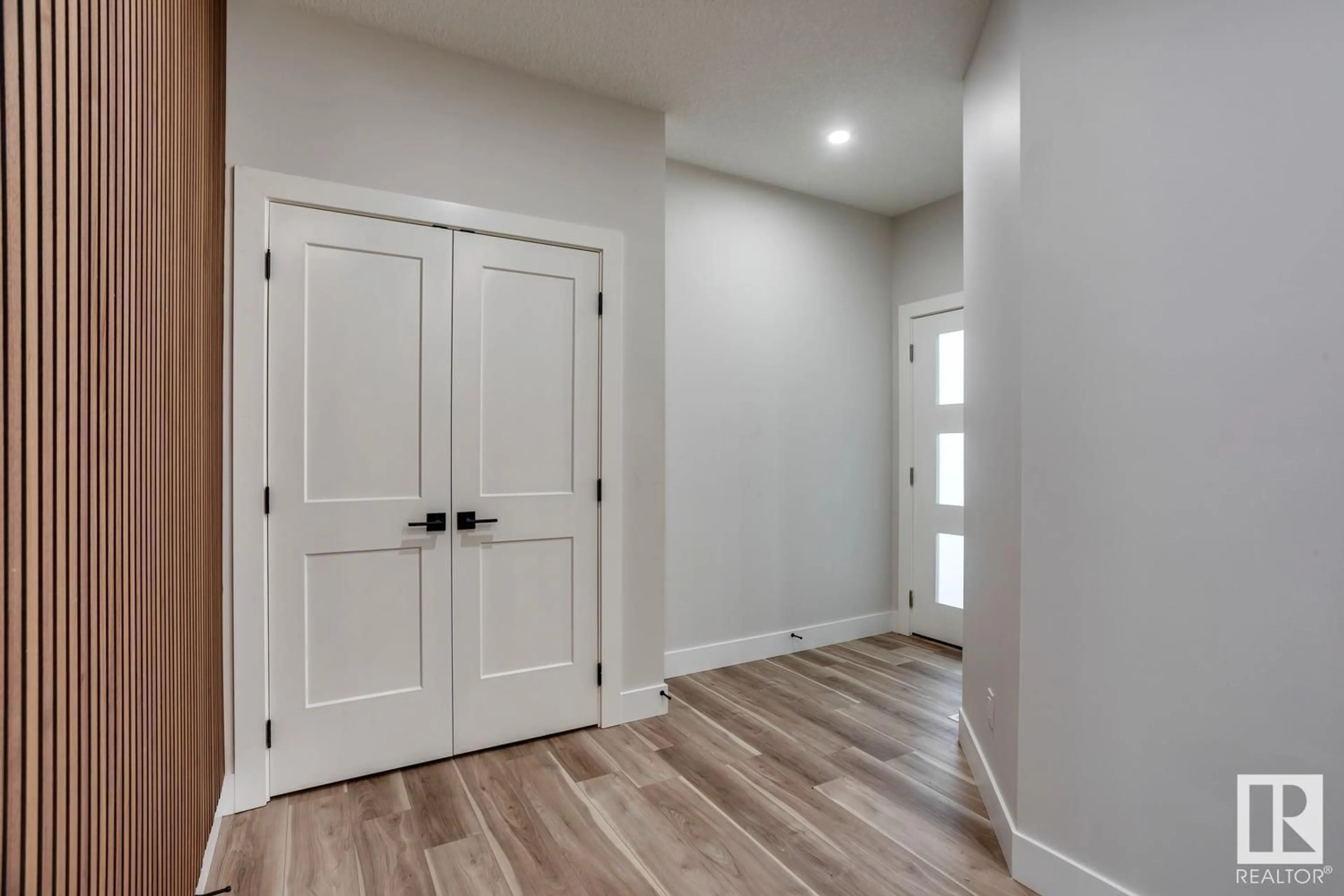 Indoor entryway, wood floors for 6257 19 ST NE, Rural Leduc County Alberta T4X3C8