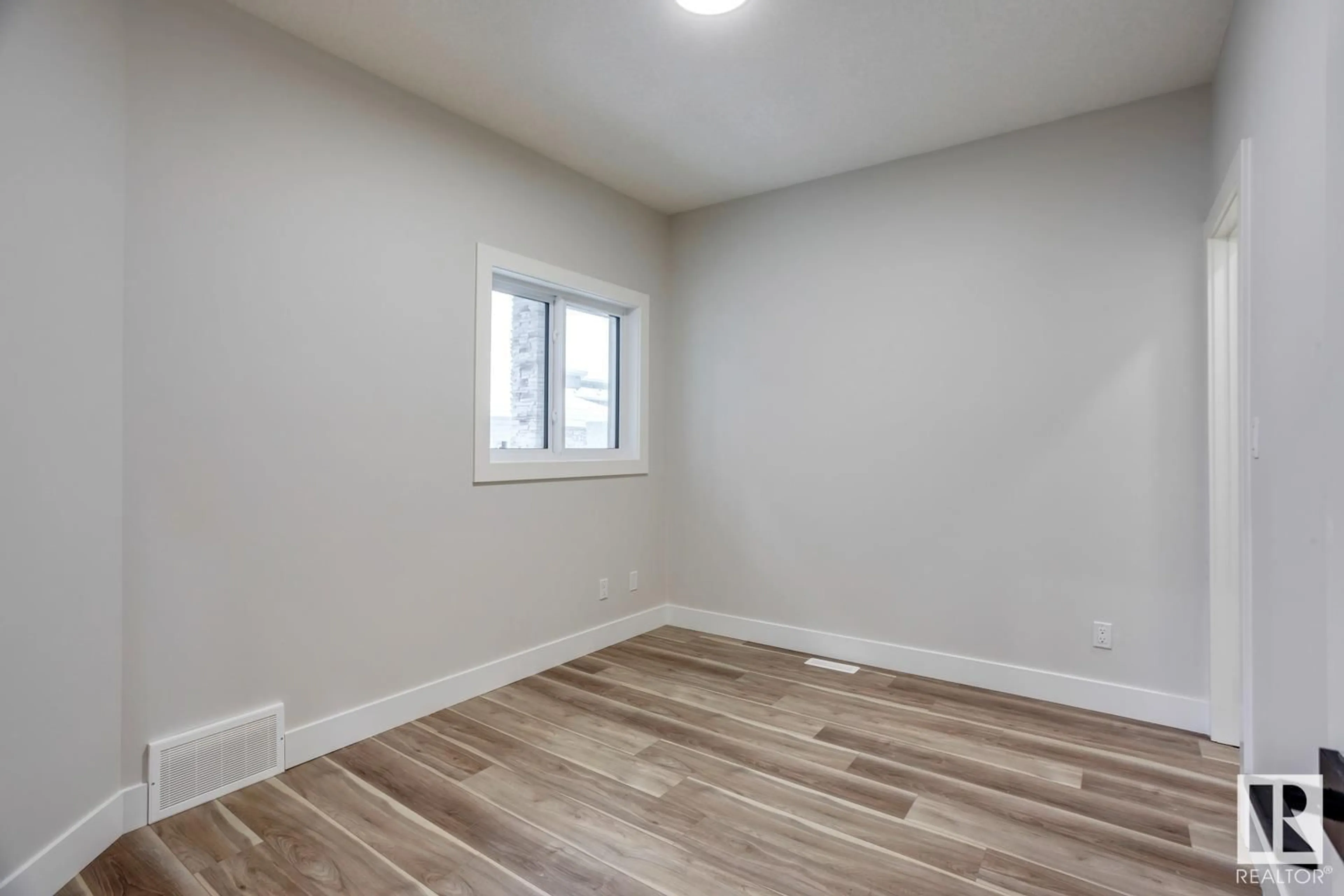 A pic of a room, wood floors for 6257 19 ST NE, Rural Leduc County Alberta T4X3C8