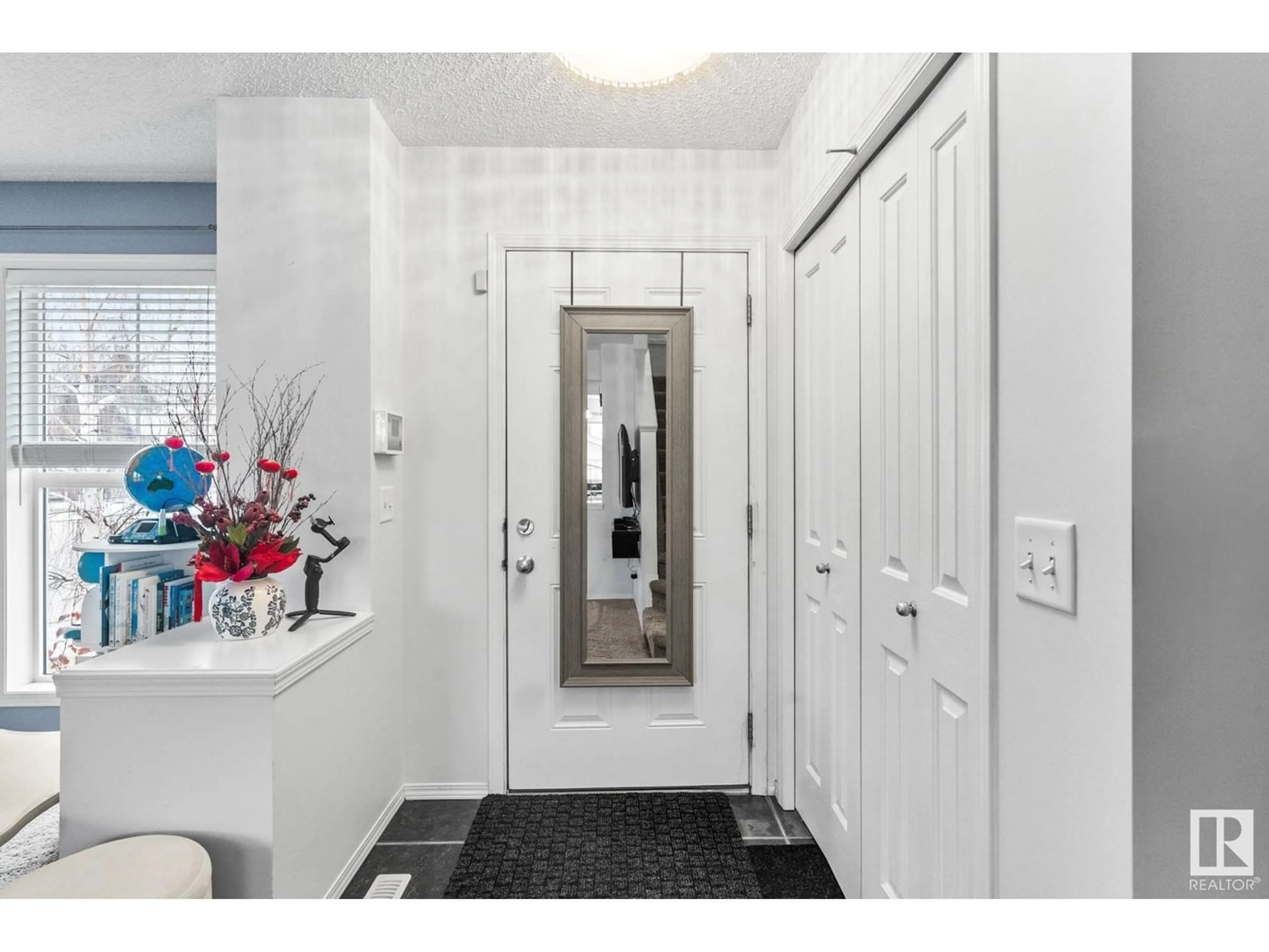 Indoor entryway, carpet floors for 6003 213 ST NW, Edmonton Alberta T6M0H7