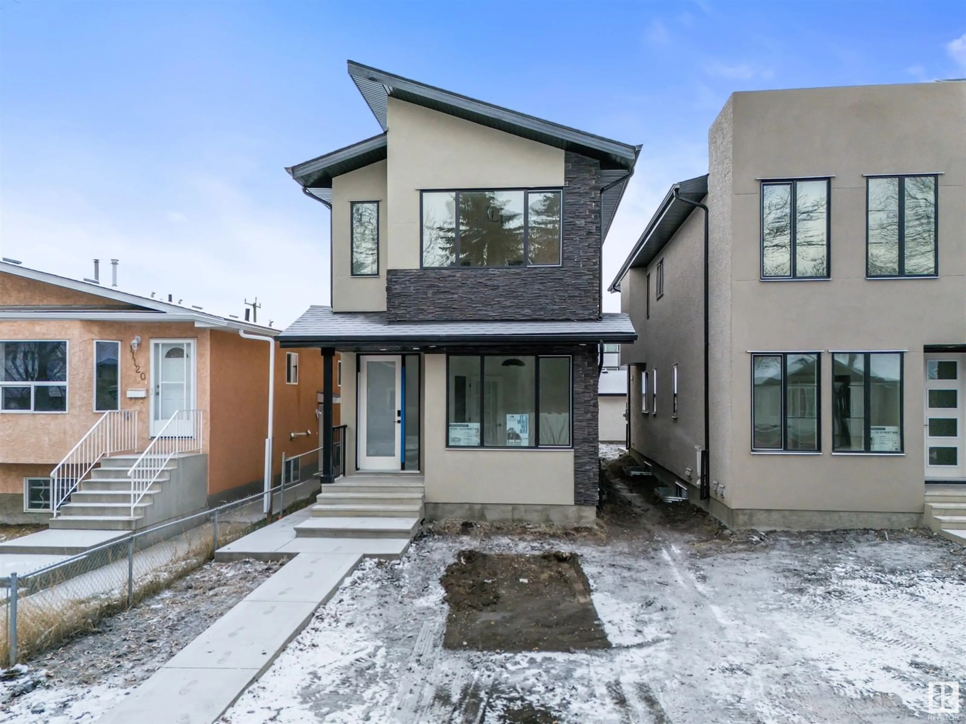 Frontside or backside of a home, the street view for 11124 132 ST NW, Edmonton Alberta T5M1E5