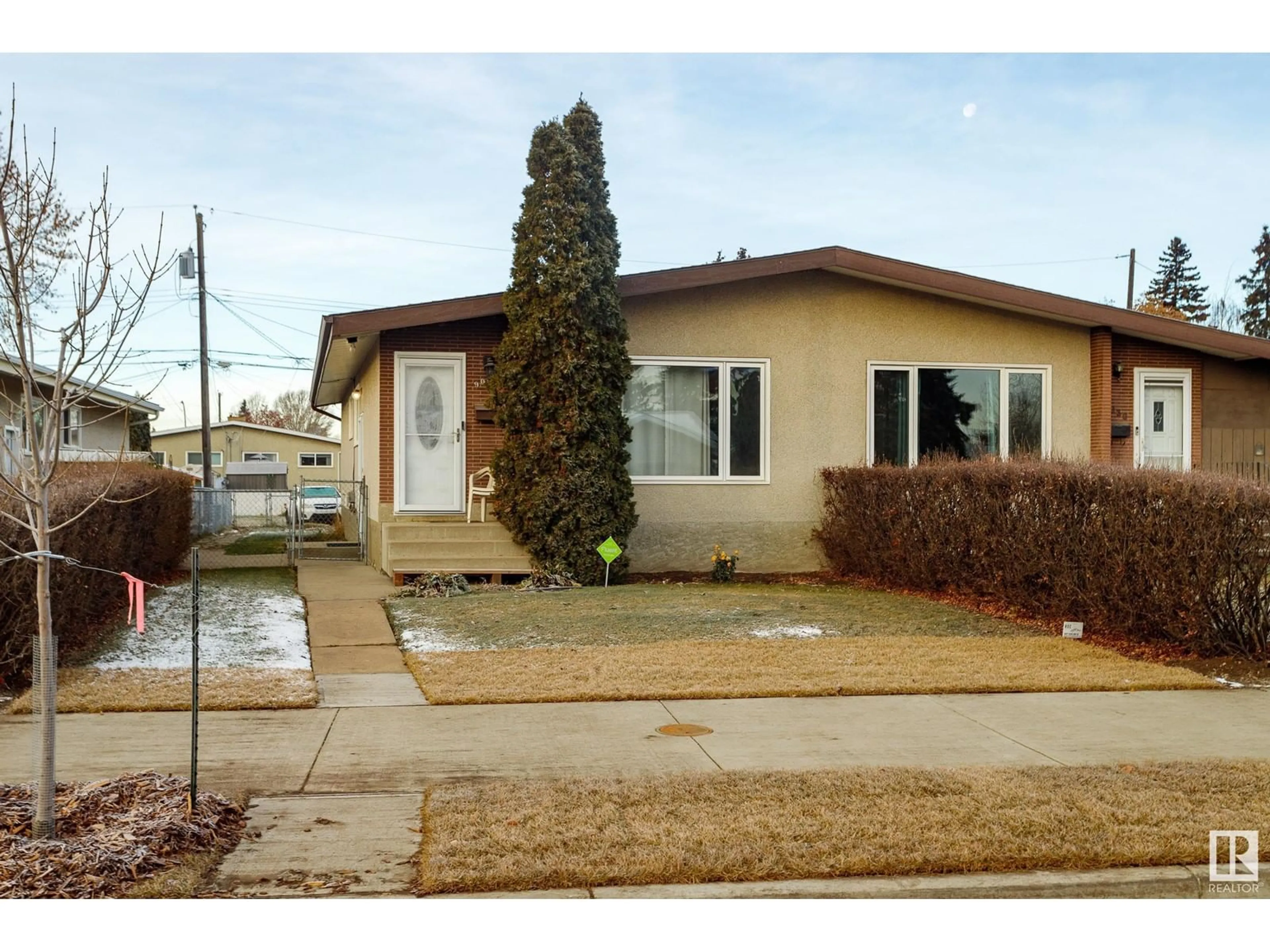 Frontside or backside of a home, the street view for 9026 58 ST NW, Edmonton Alberta T6B1K9