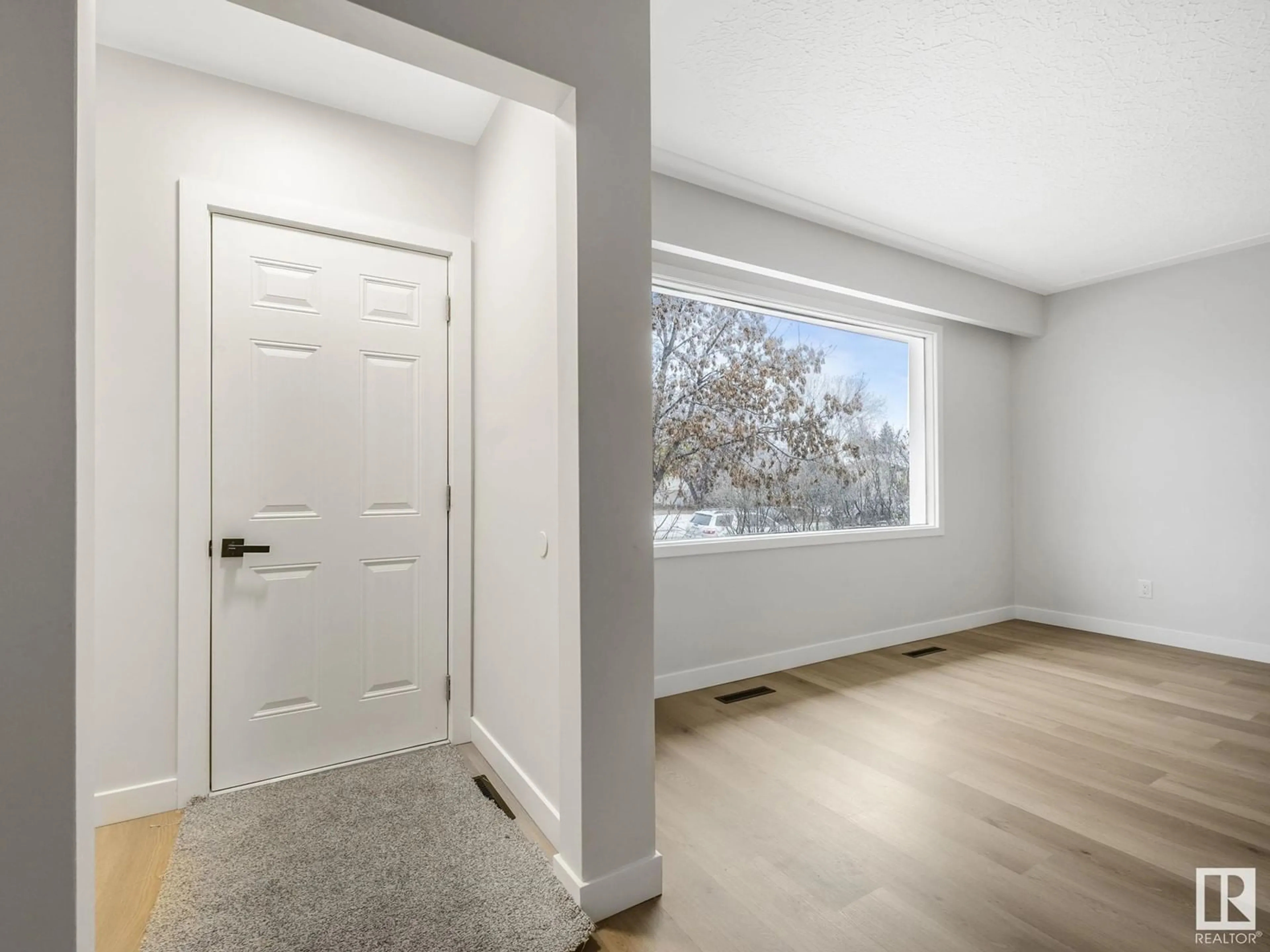 Indoor entryway, wood floors for 12823 87 ST NW, Edmonton Alberta T5T3E2