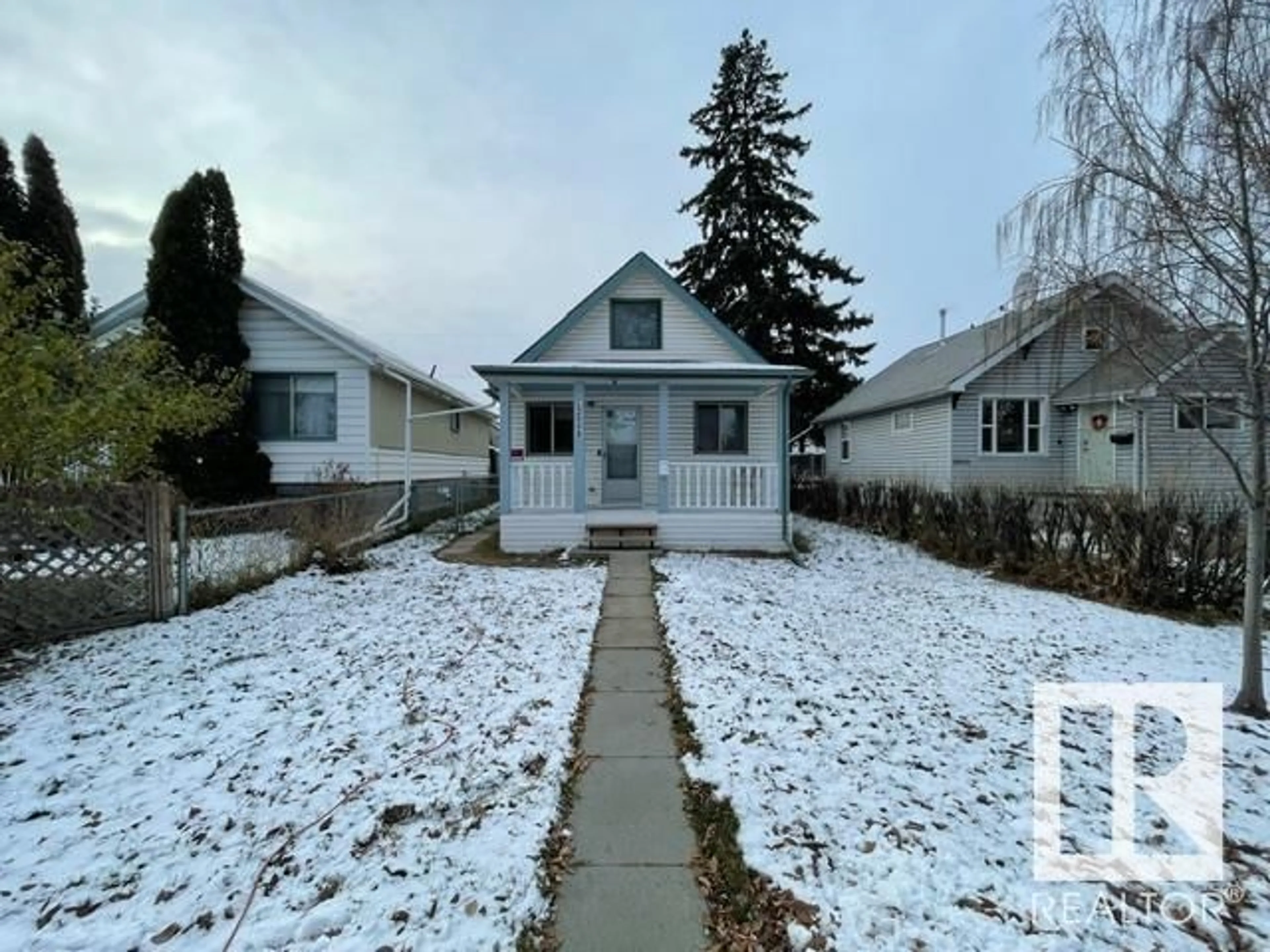 Frontside or backside of a home, the street view for 12008 77 ST NW, Edmonton Alberta T5B2G7