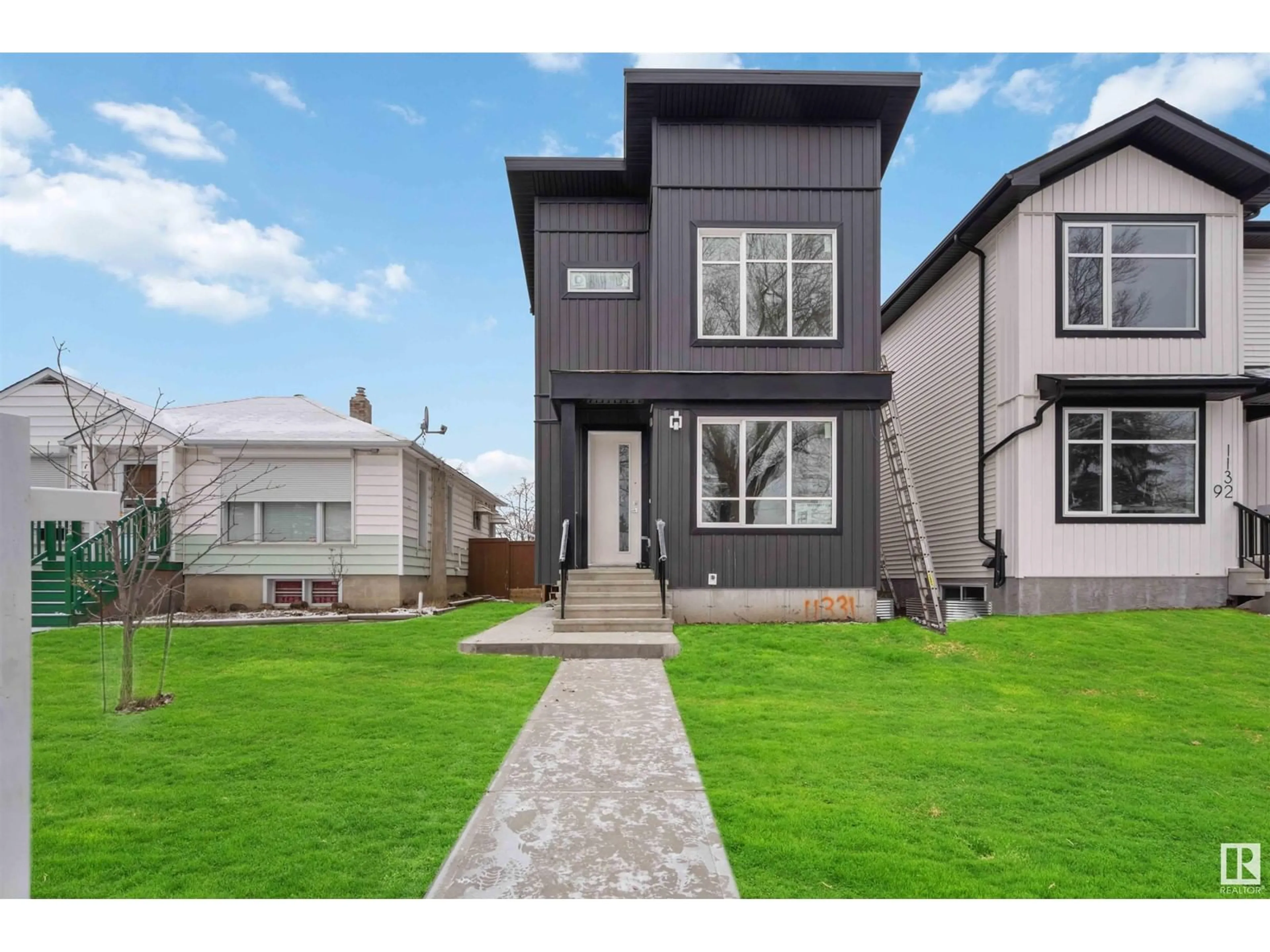 Frontside or backside of a home, the fenced backyard for 11331 103 ST NW, Edmonton Alberta T5G2H8