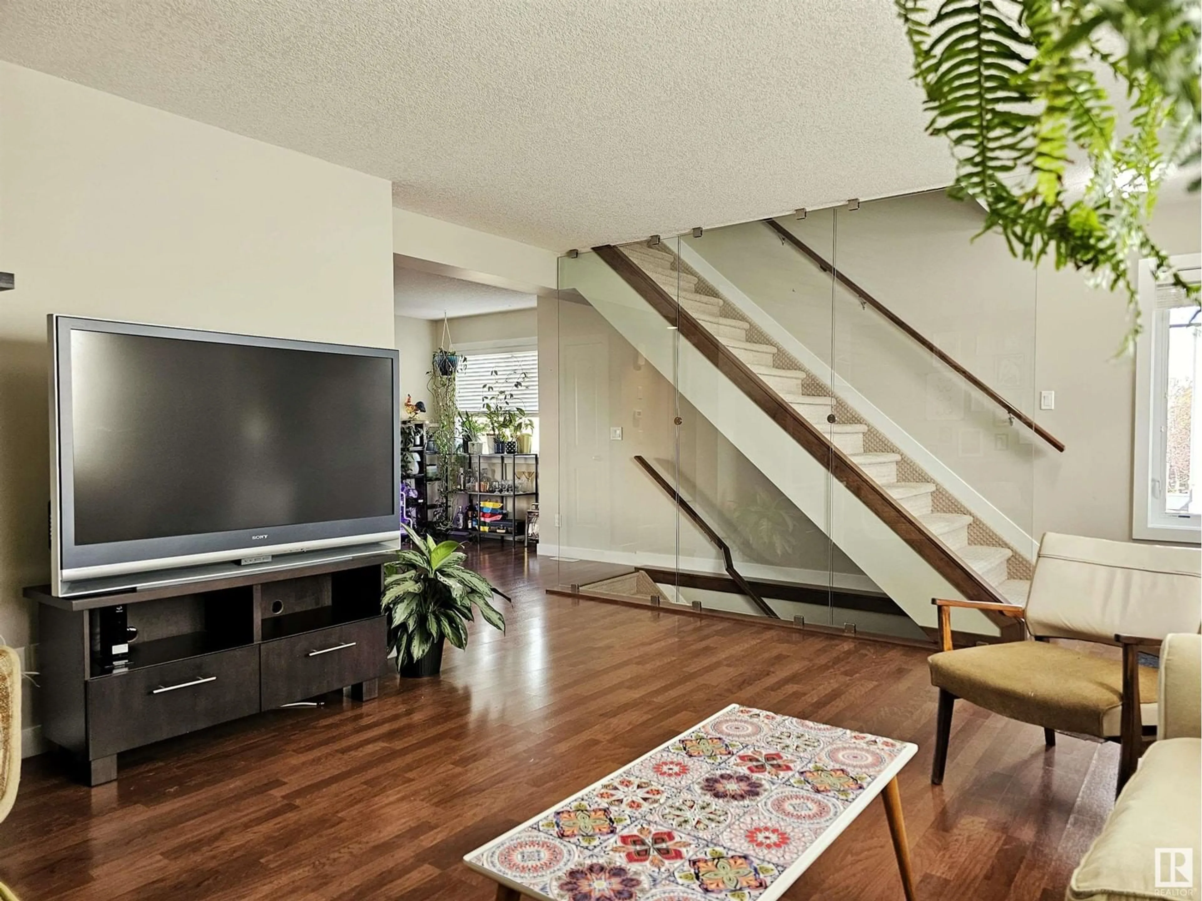 Living room, wood floors for #12 13810 166 AV NW, Edmonton Alberta T6V0K4