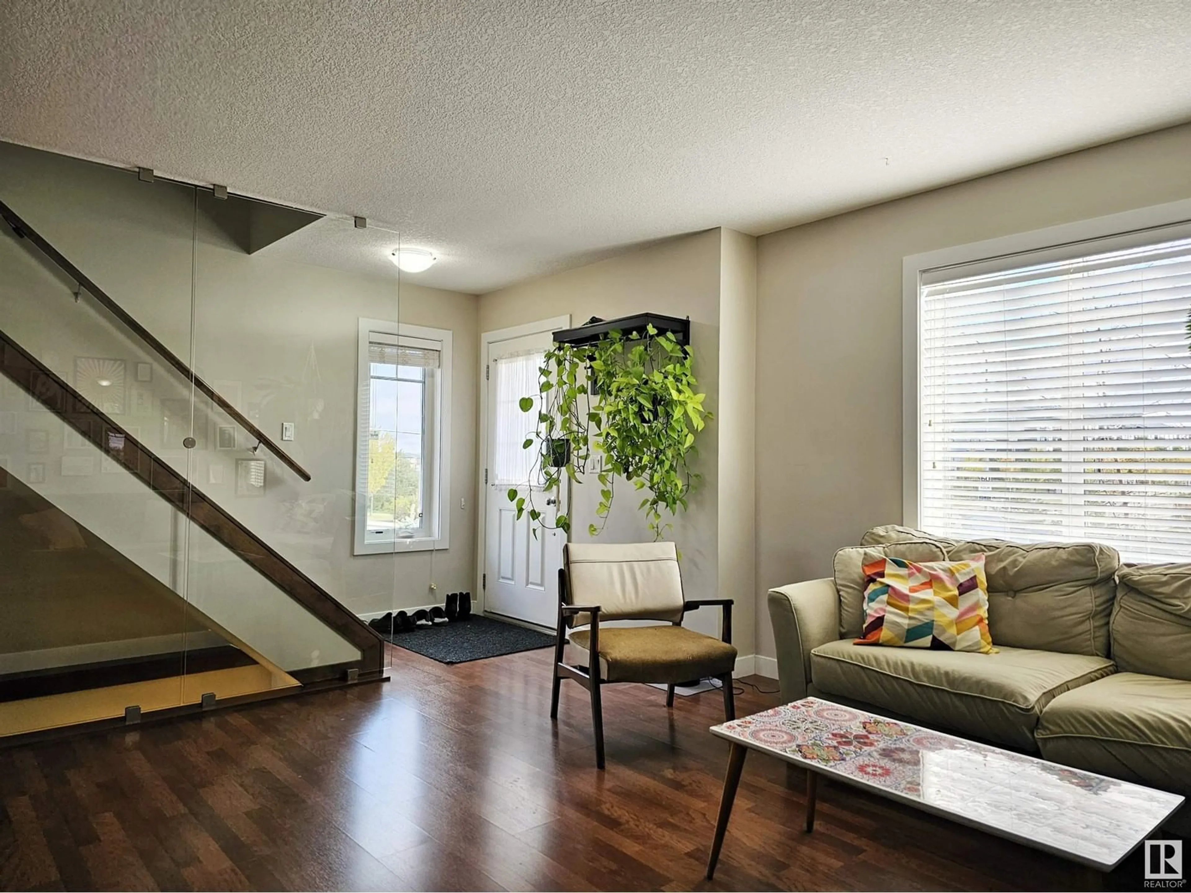 Living room, wood floors for #12 13810 166 AV NW, Edmonton Alberta T6V0K4