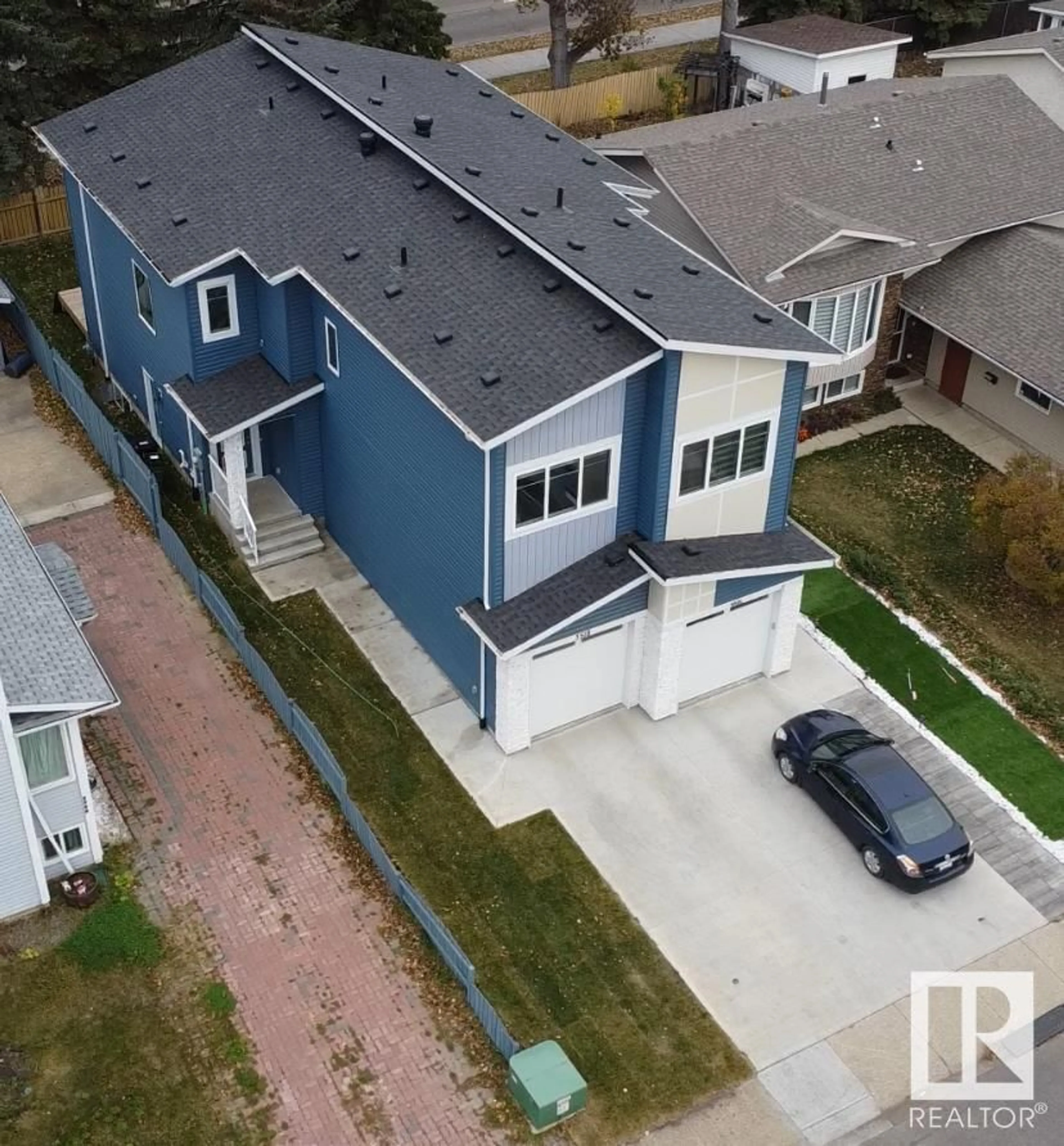 Frontside or backside of a home, the street view for 3518 33 AV NW, Edmonton Alberta T6L5G6