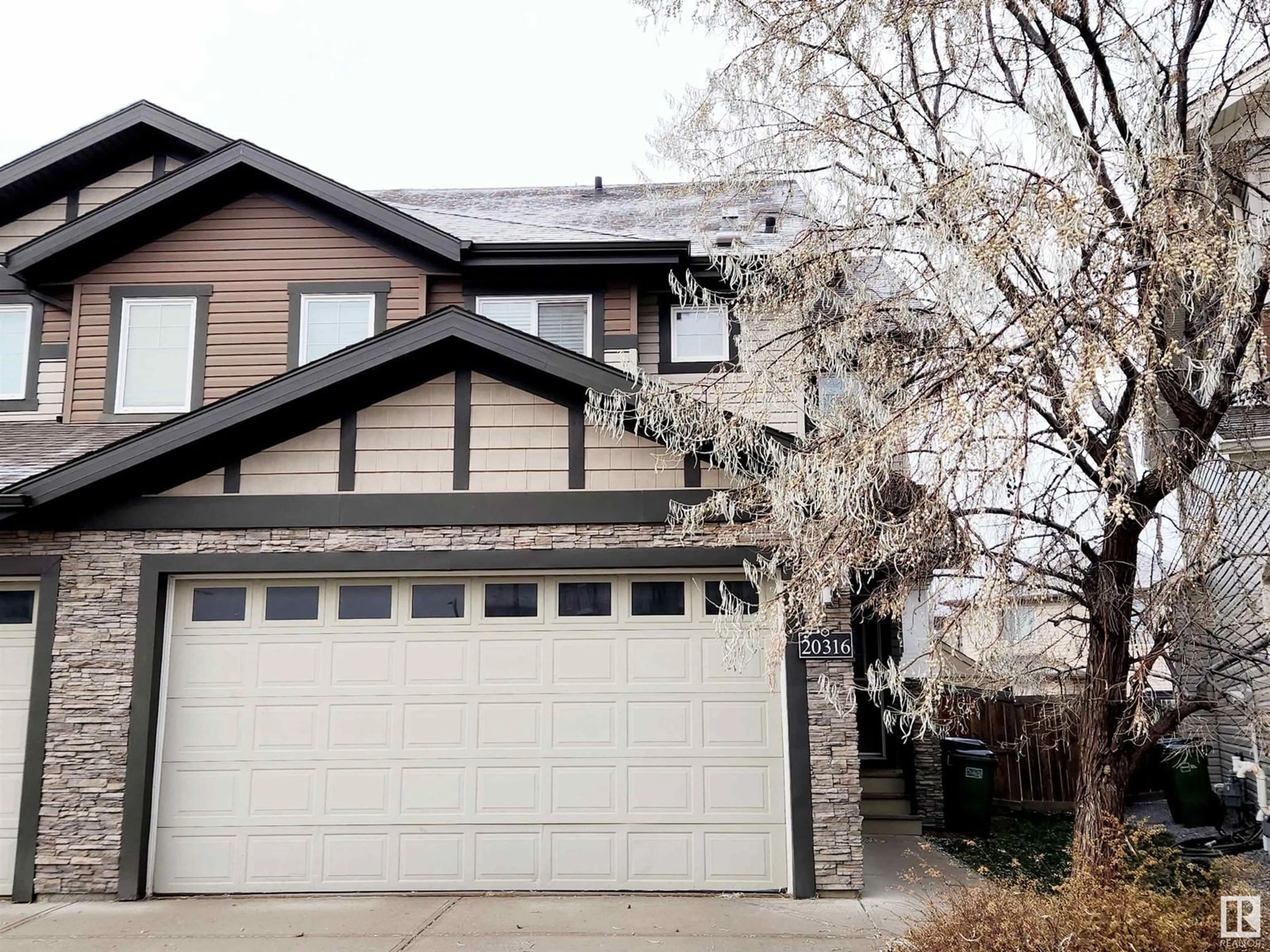 Frontside or backside of a home, the street view for 20316 43 AV NW, Edmonton Alberta T6M0R8